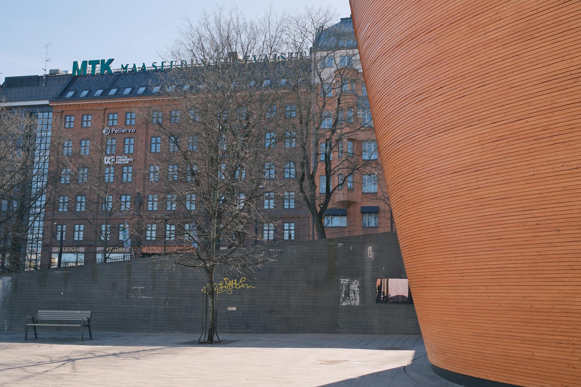 Modern Helsinki architecture and open city space for mobility planning.