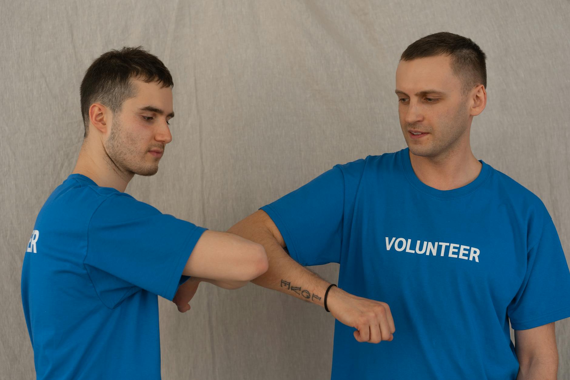 Volunteers greeting each other for Helsinki host planning.