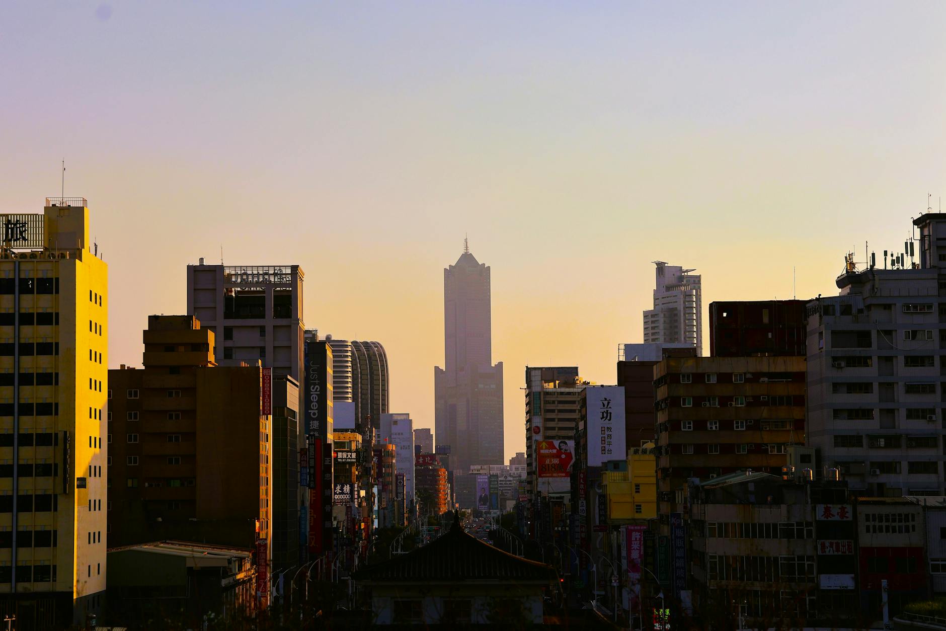 Kaohsiung skyline and conference arrival timing context.