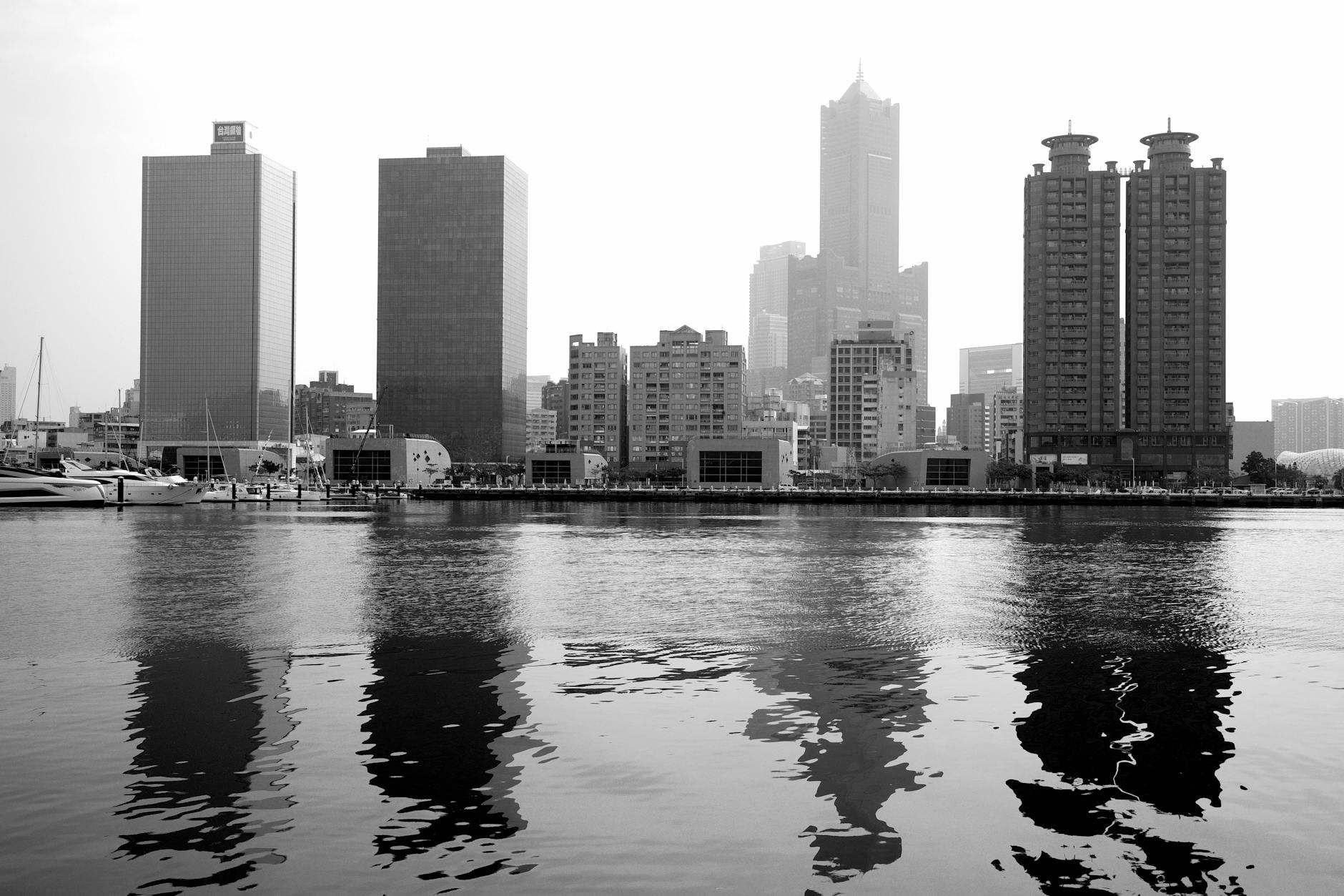 Kaohsiung skyline and comfortable hotel-base planning context.