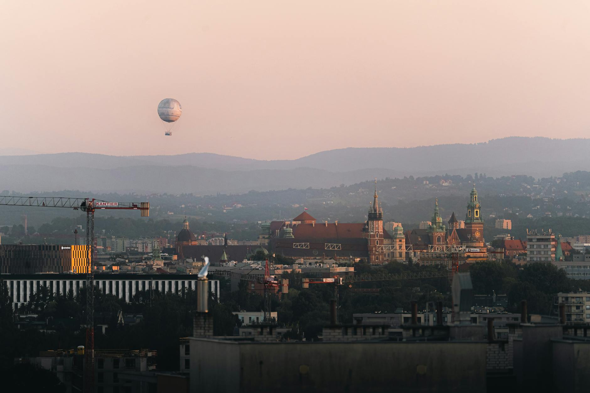 Krakow skyline for academic conference attendee report planning.