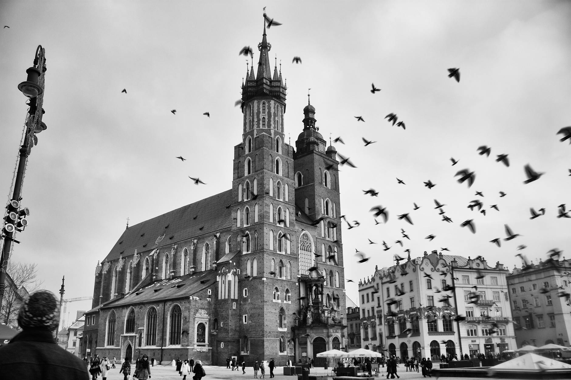 Krakow hotel and evening street setting for solo traveler return planning.