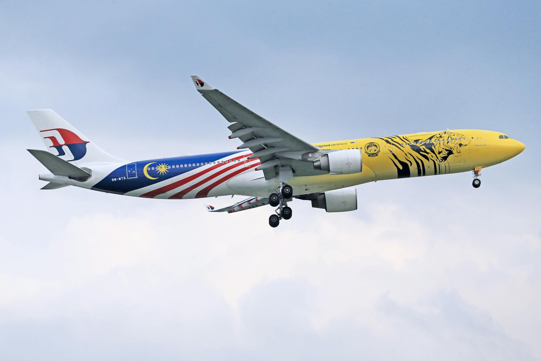Langkawi airport arrival and confidential deal-team access planning context.