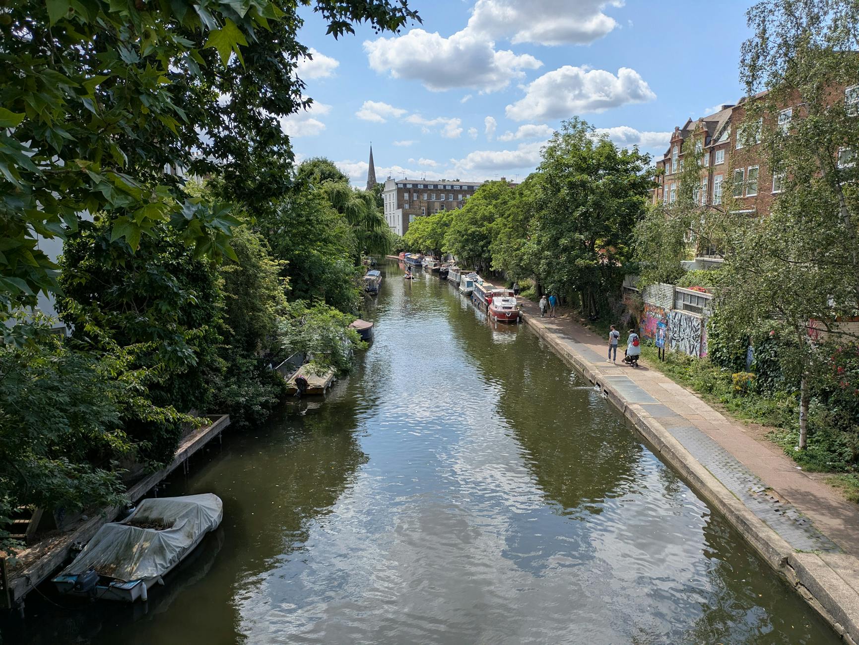 Regent's Canal in London with boats and greenery