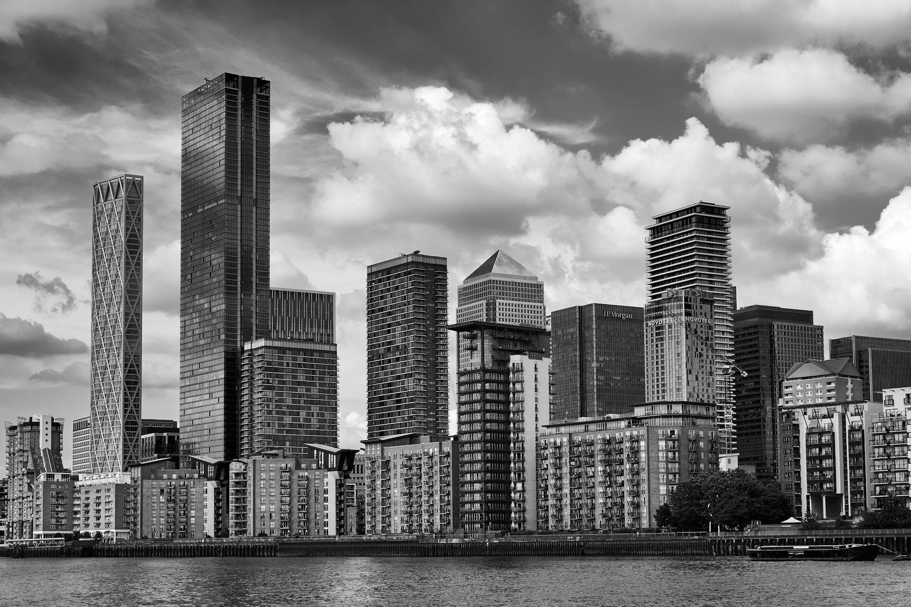 Canary Wharf skyline under cloudy London skies
