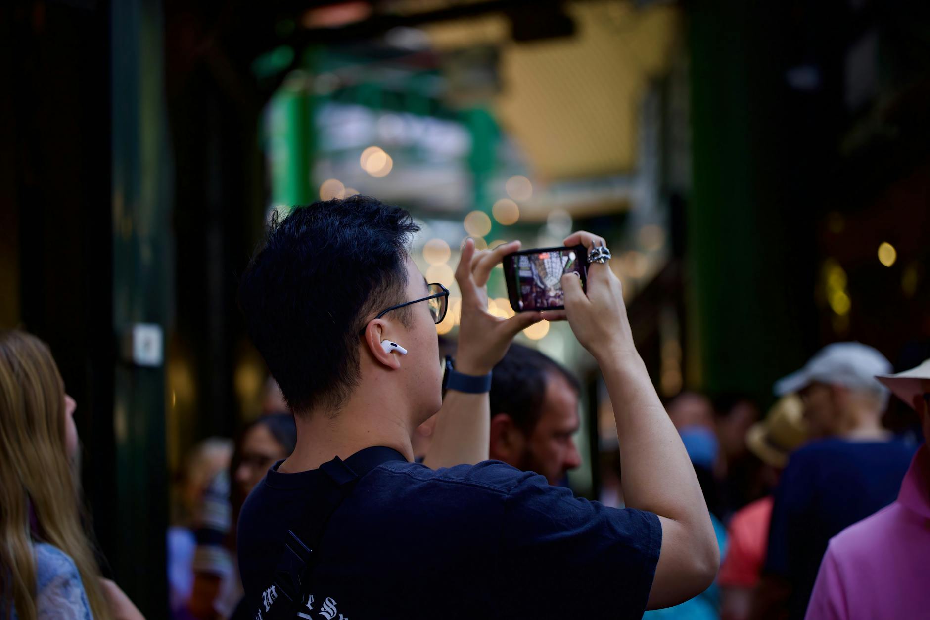 Creator photographing the atmosphere at Borough Market in London