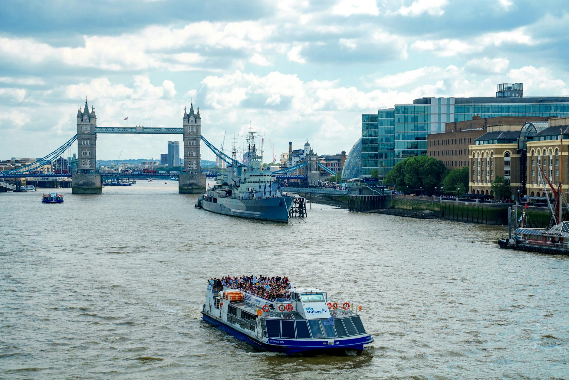 Tourist boat on the River Thames near Tower Bridge