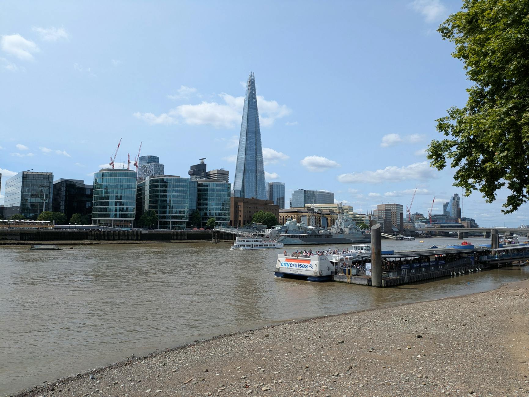 City cruises on the Thames with The Shard in the background