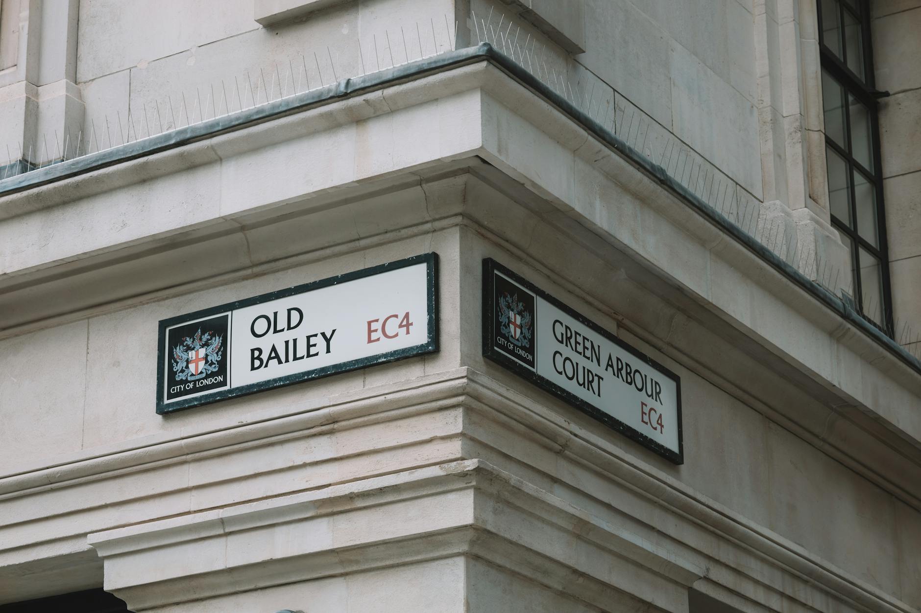 Old Bailey and Green Arbour Court street signs in London
