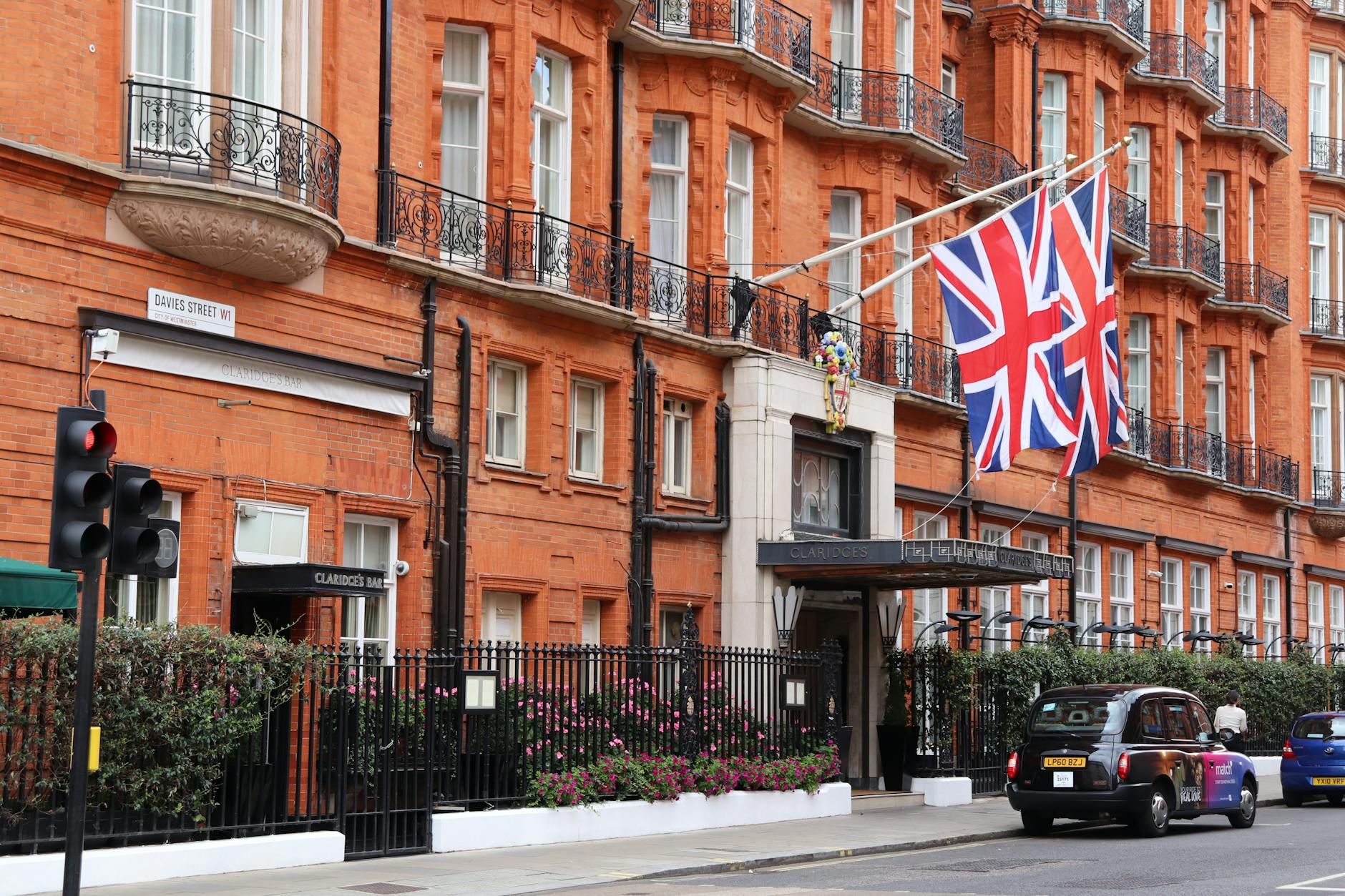 Classic London hotel exterior with Union Jack flags