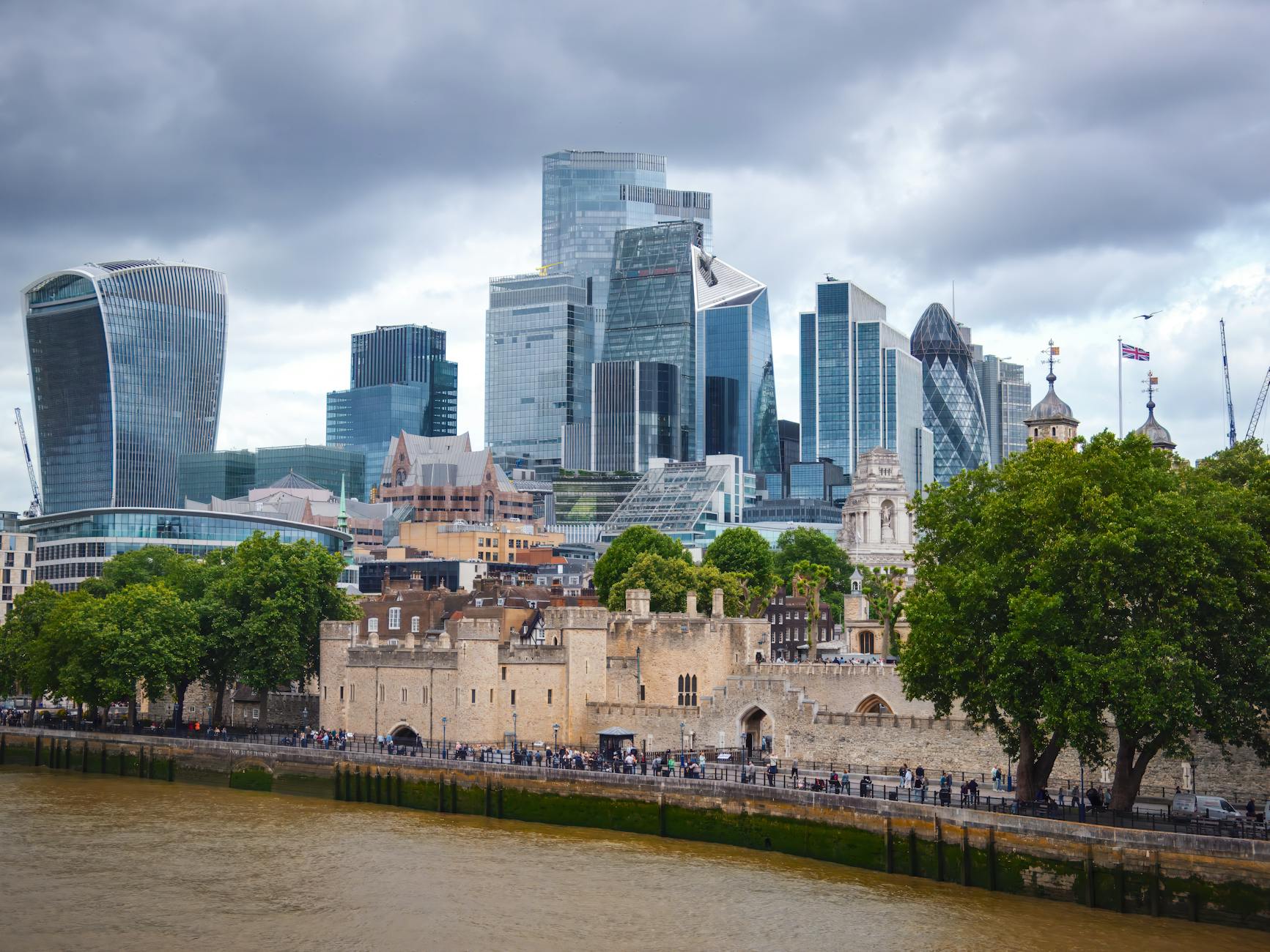 London skyline with modern business towers and Tower of London context