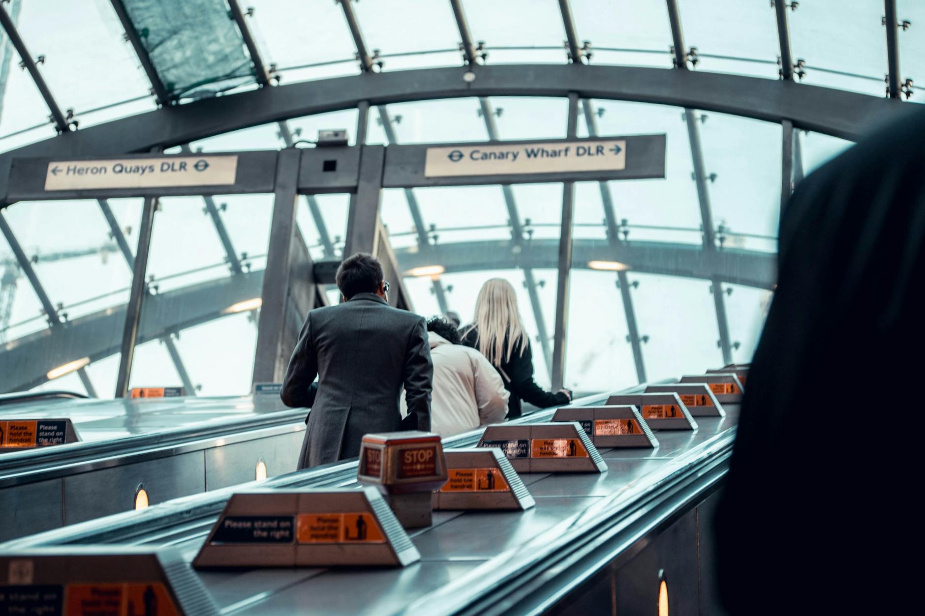 Canary Wharf station escalators and commuter movement for event-day pacing