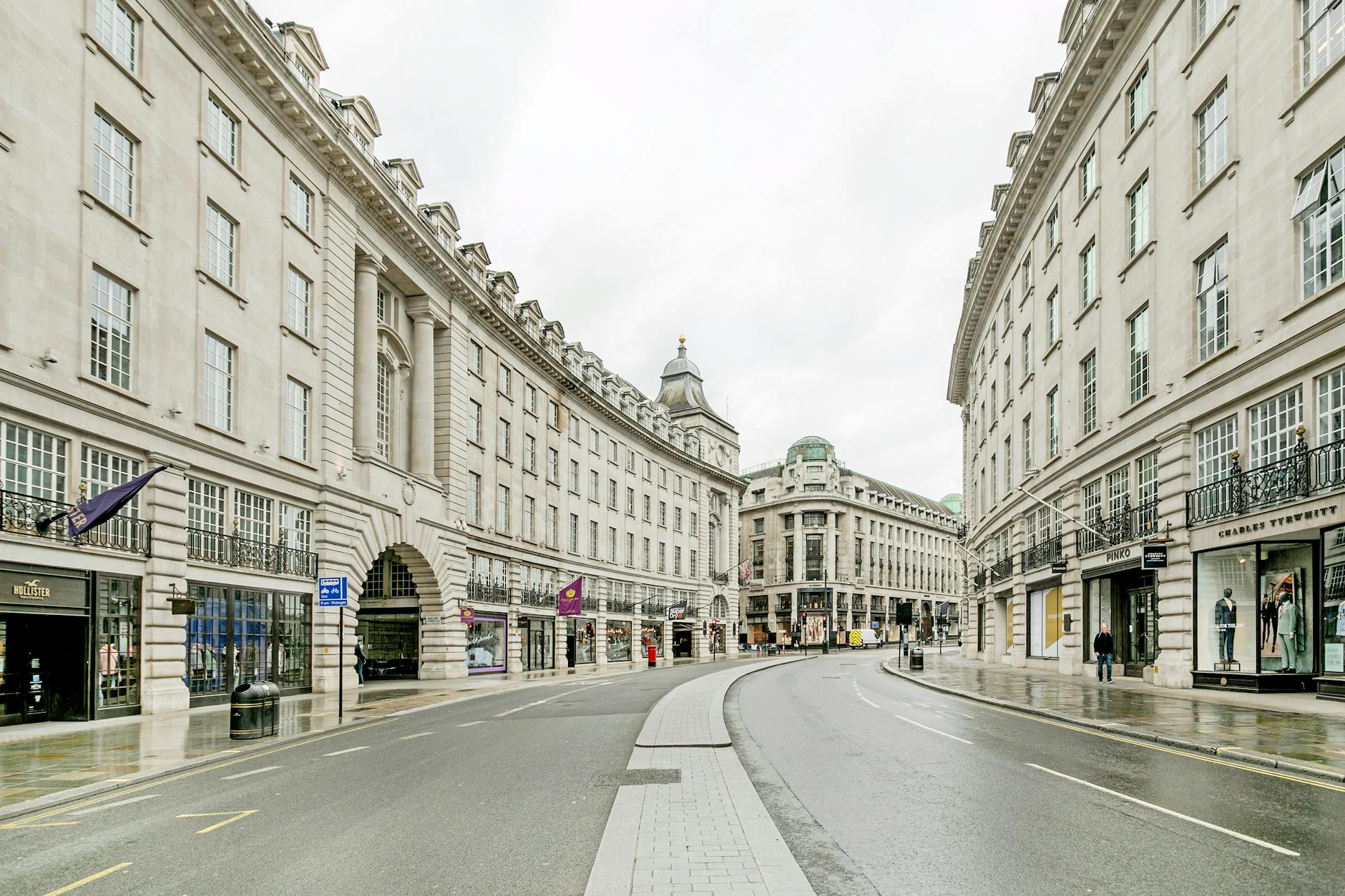 Quiet Regent Street pavement and street context in central London
