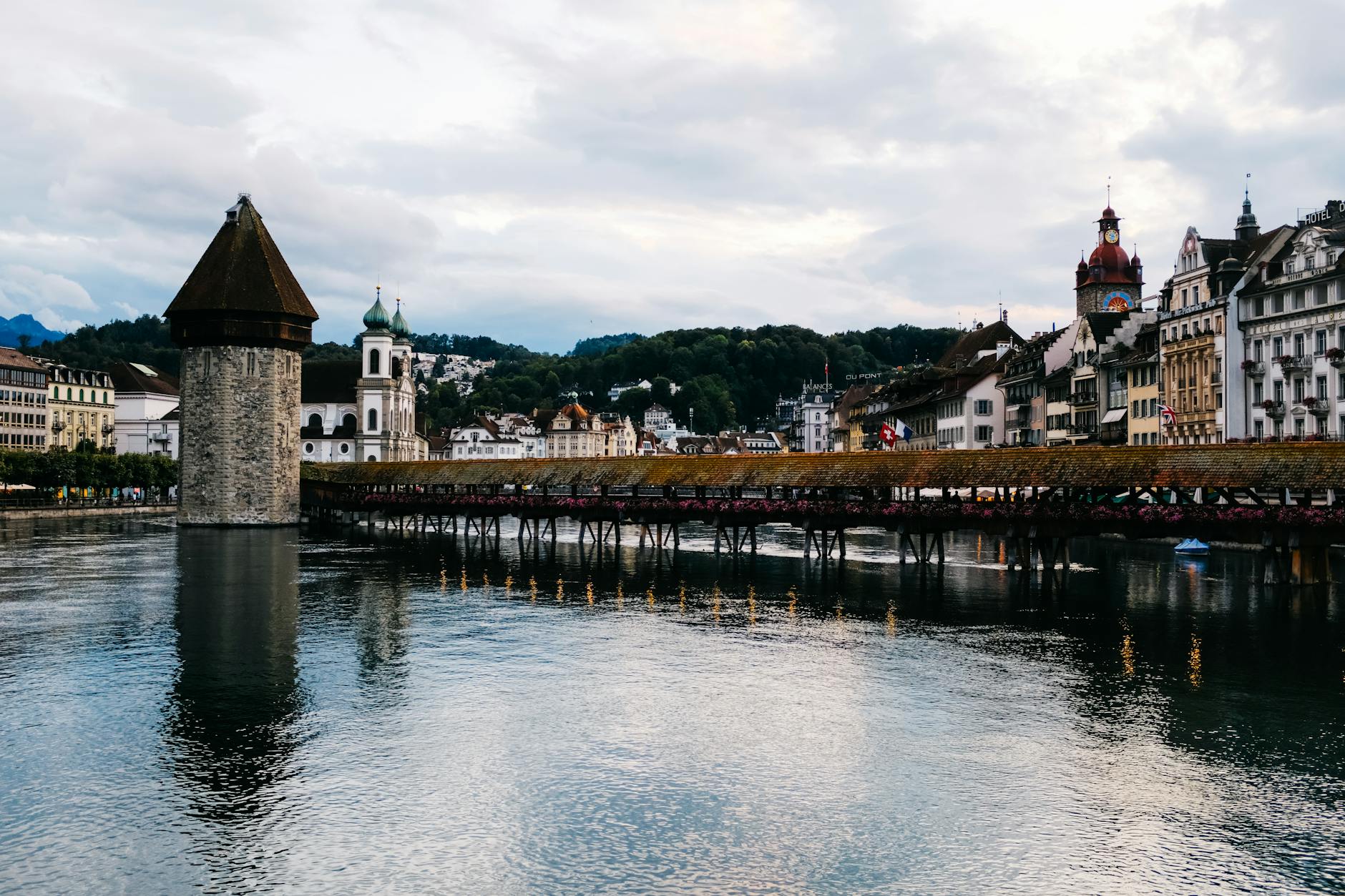 Chapel Bridge and Reuss River in Lucerne context for business hospitality planning.