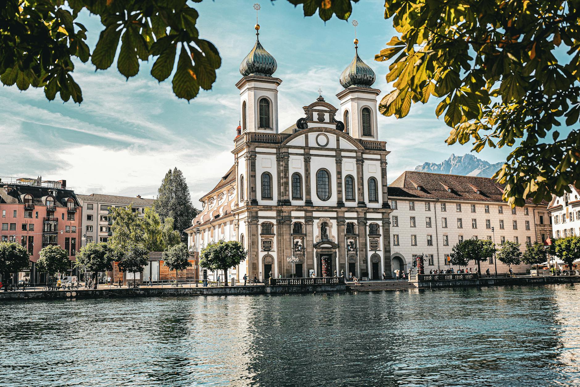 Lucerne waterfront and Jesuit Church context for conference attendee planning.