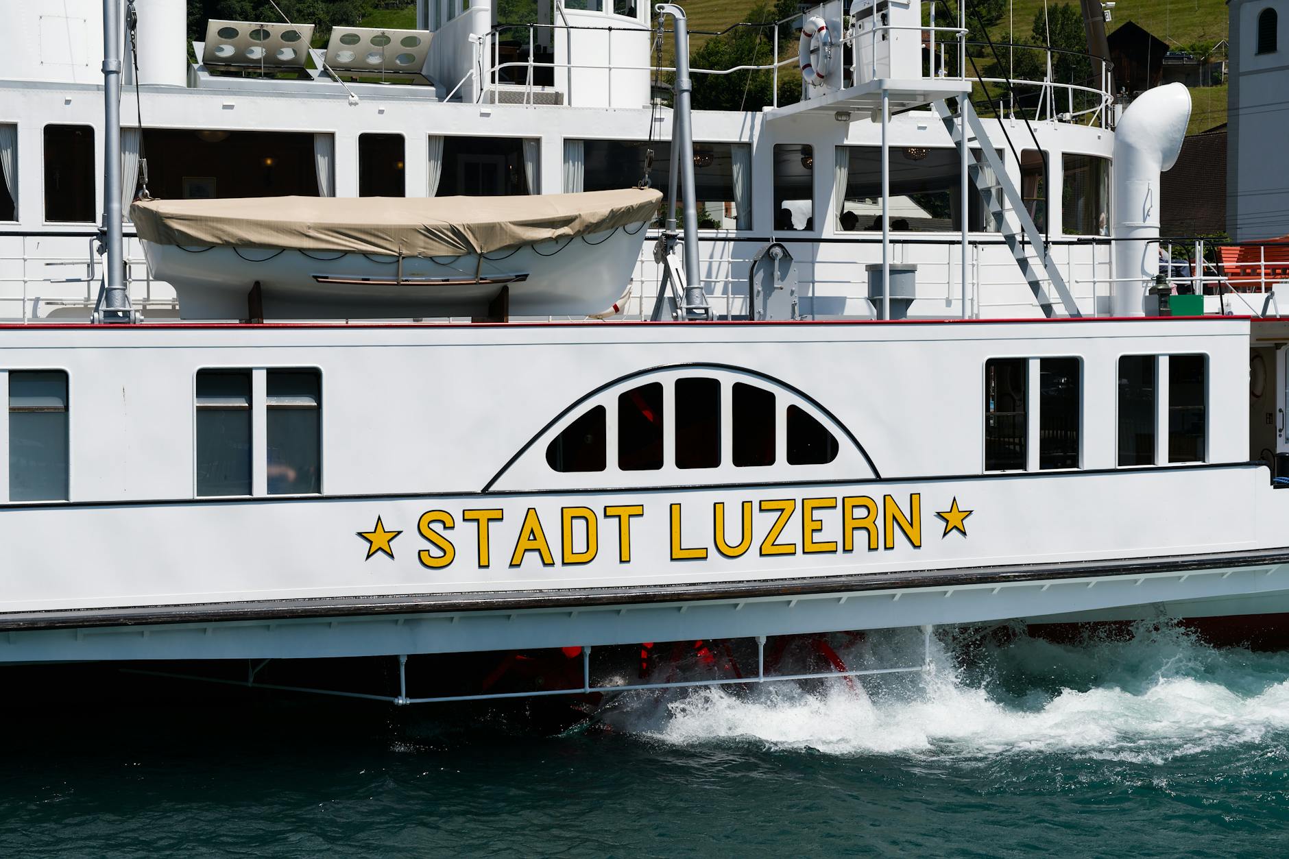 Paddle steamer on Lake Lucerne for family lake excursion planning.