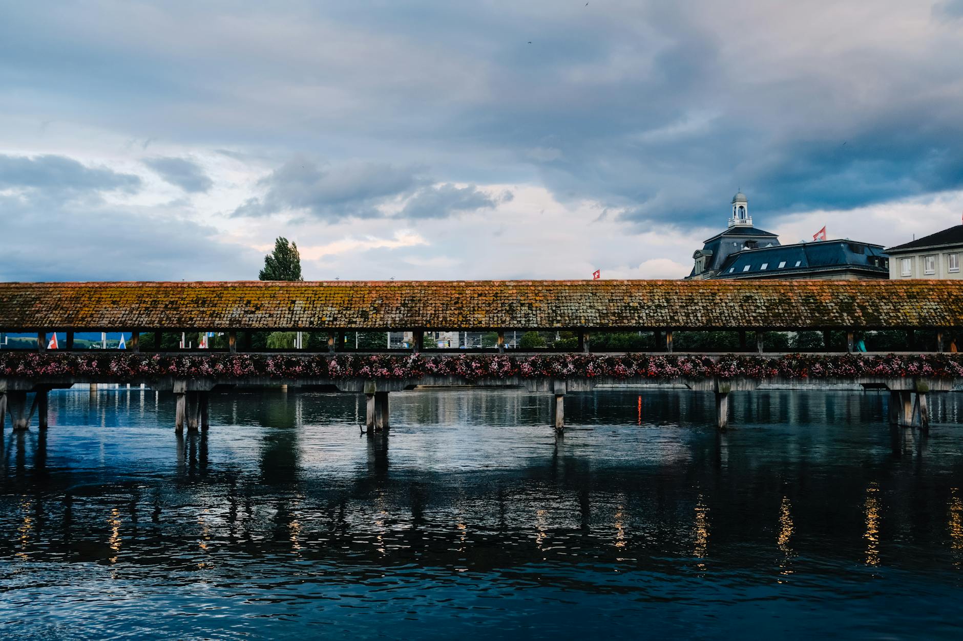 Chapel Bridge over the Reuss in Lucerne for weather-aware sightseeing.