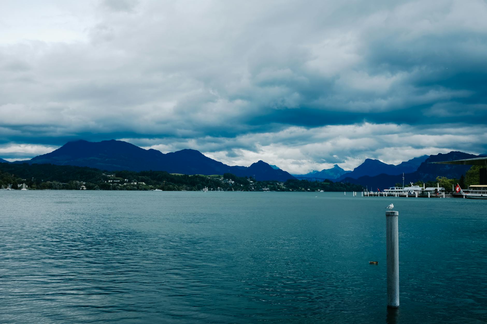Lake Lucerne and cloudy mountains for journalist assignment planning.