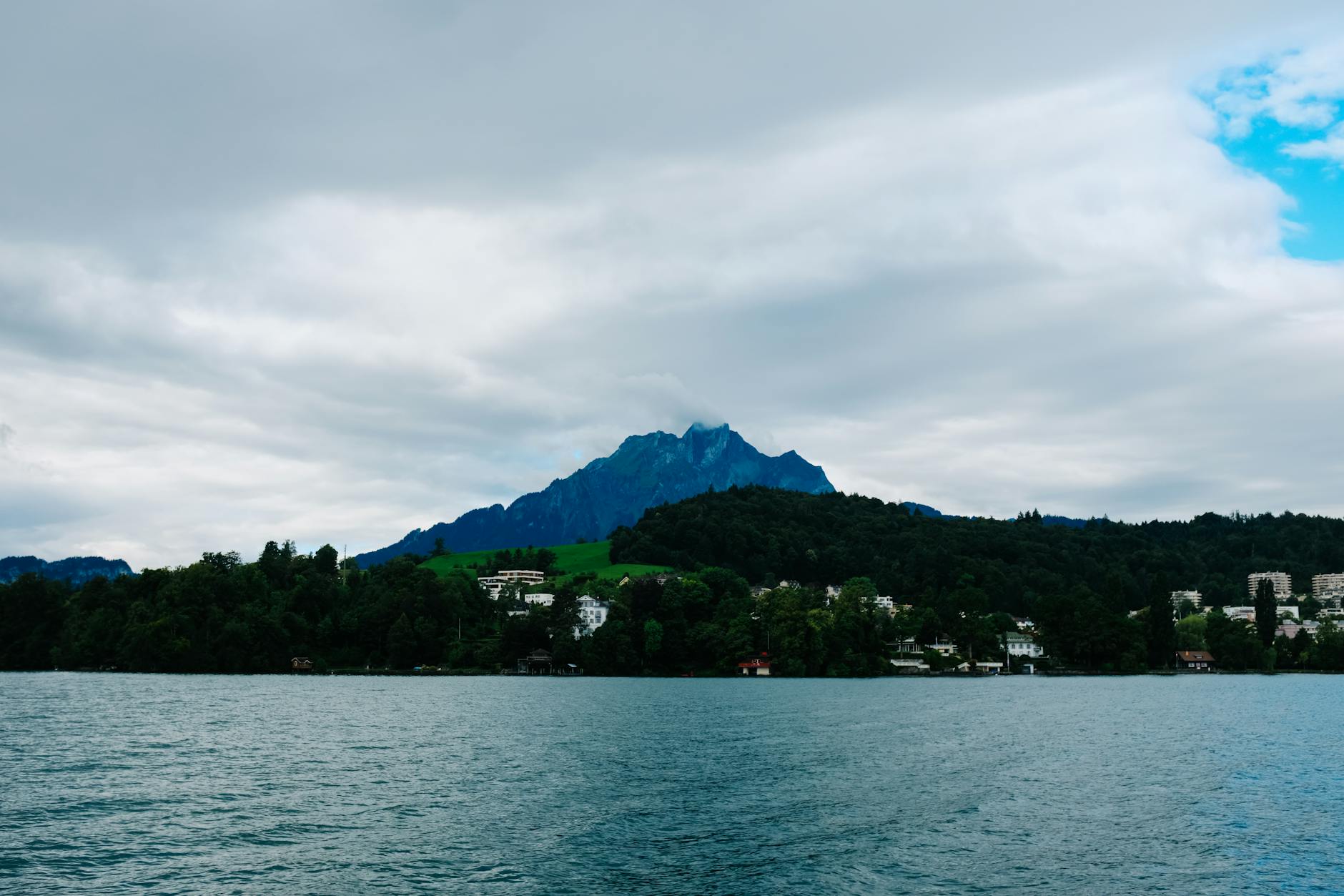 Quiet Lake Lucerne mountain view for journalist story angle planning.