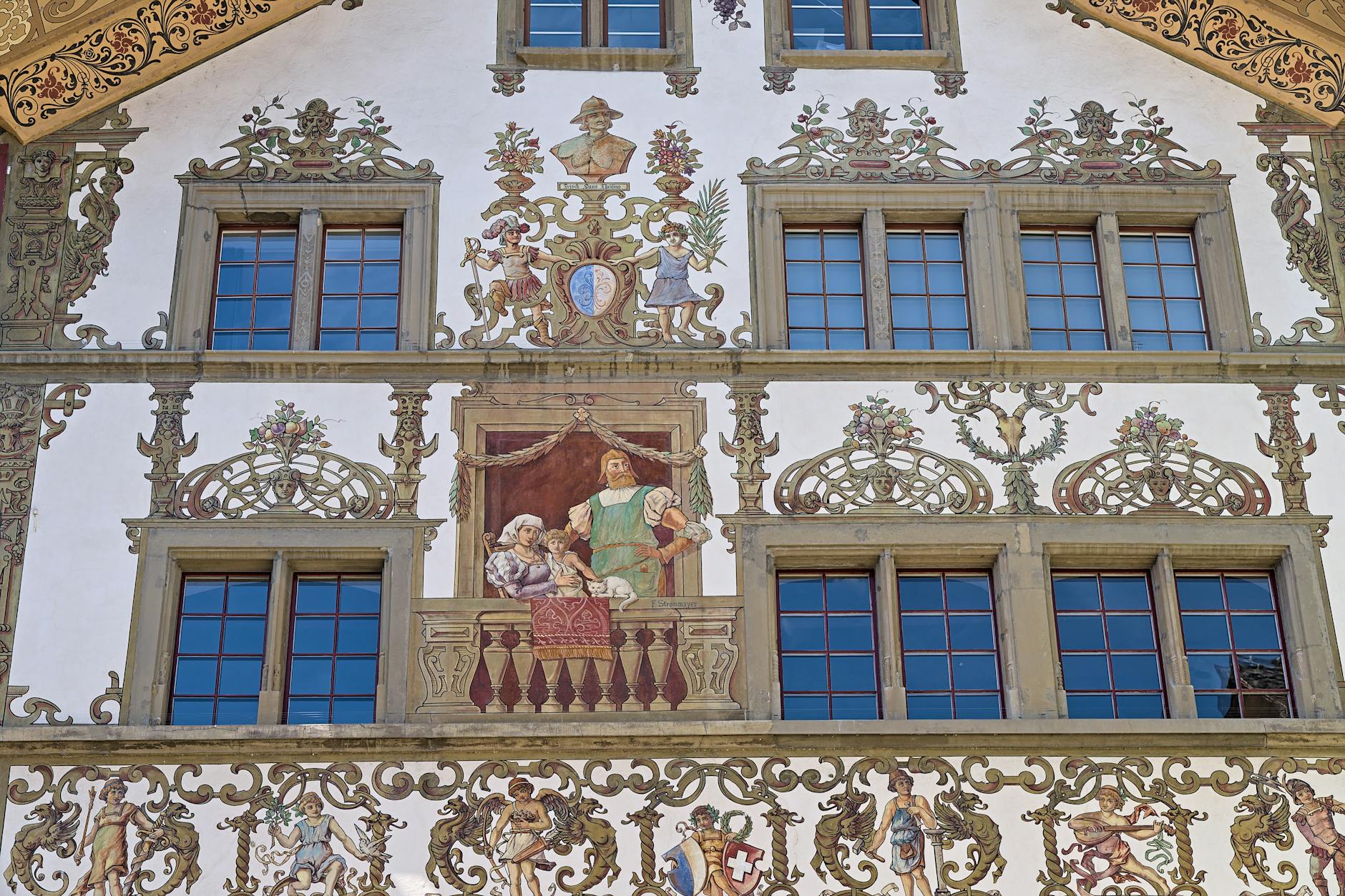 Painted Lucerne facade for journalist travel report and source planning.