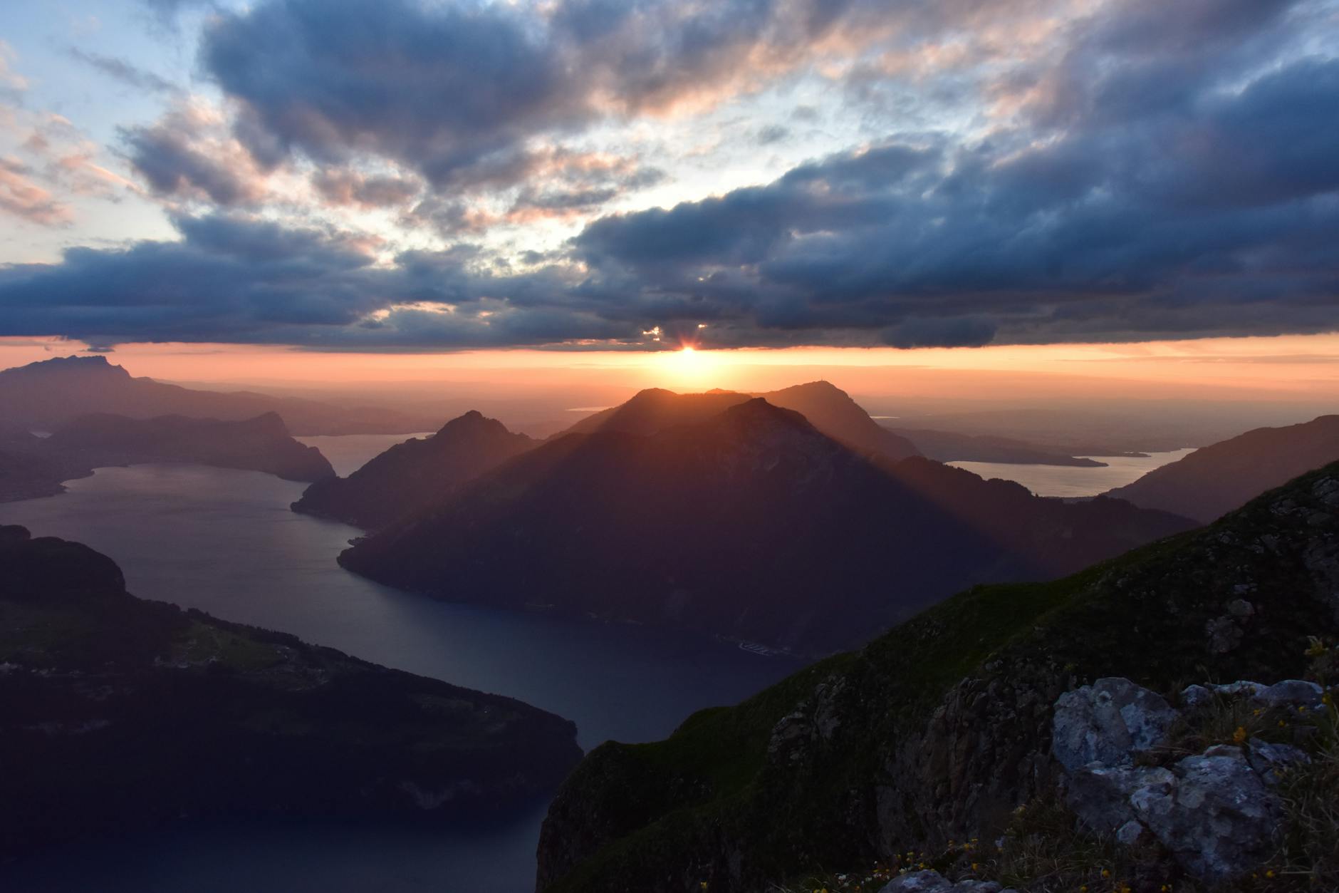 Dramatic Lake Lucerne sunset for nightlife recovery and next-morning planning.