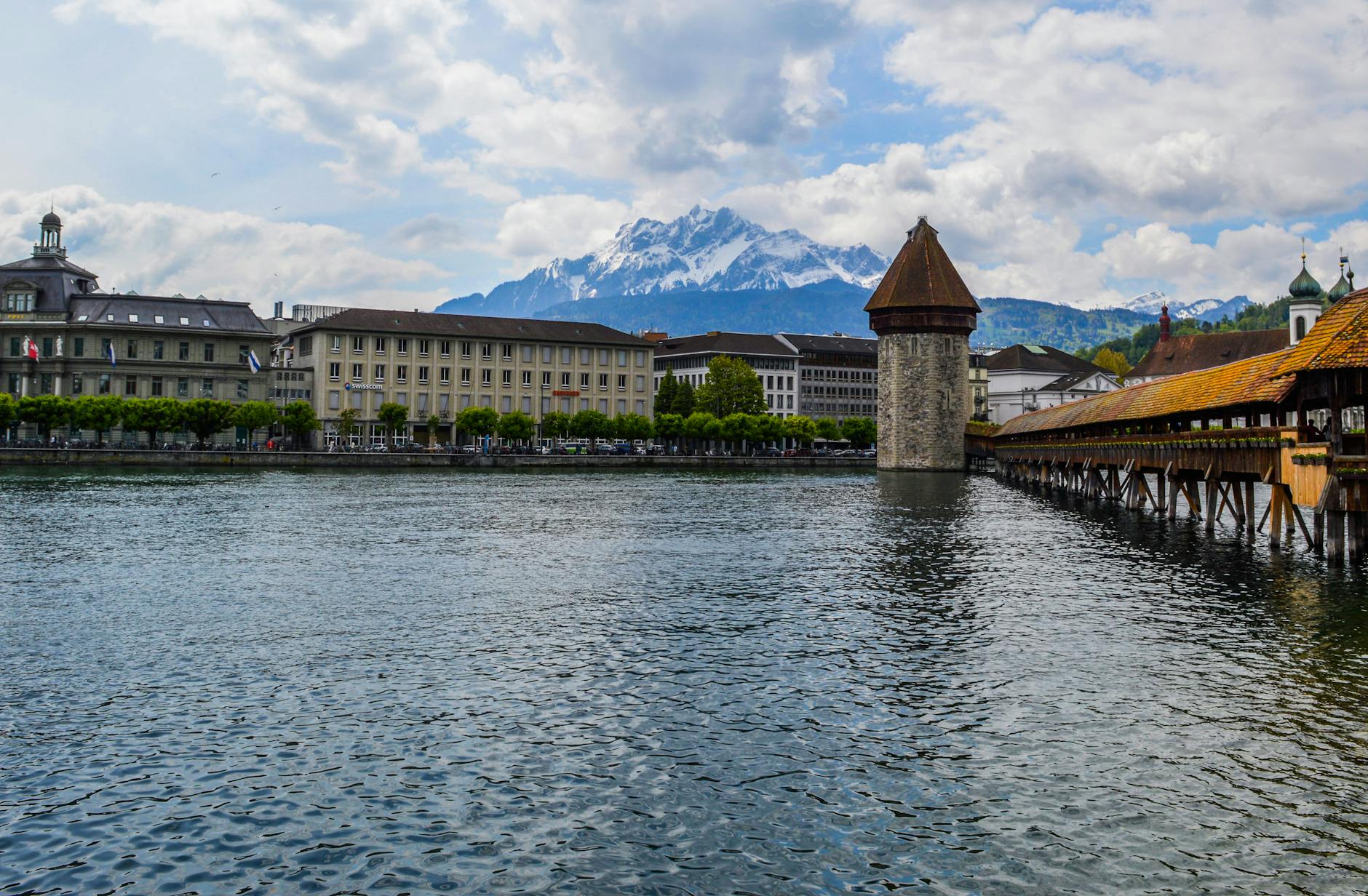 Chapel Bridge and Water Tower context for luggage-aware Lucerne arrival.