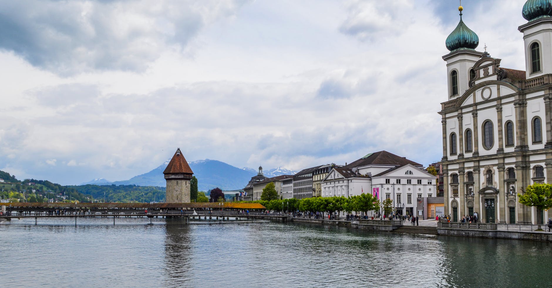 Lucerne medieval riverside buildings context for older traveler report planning.
