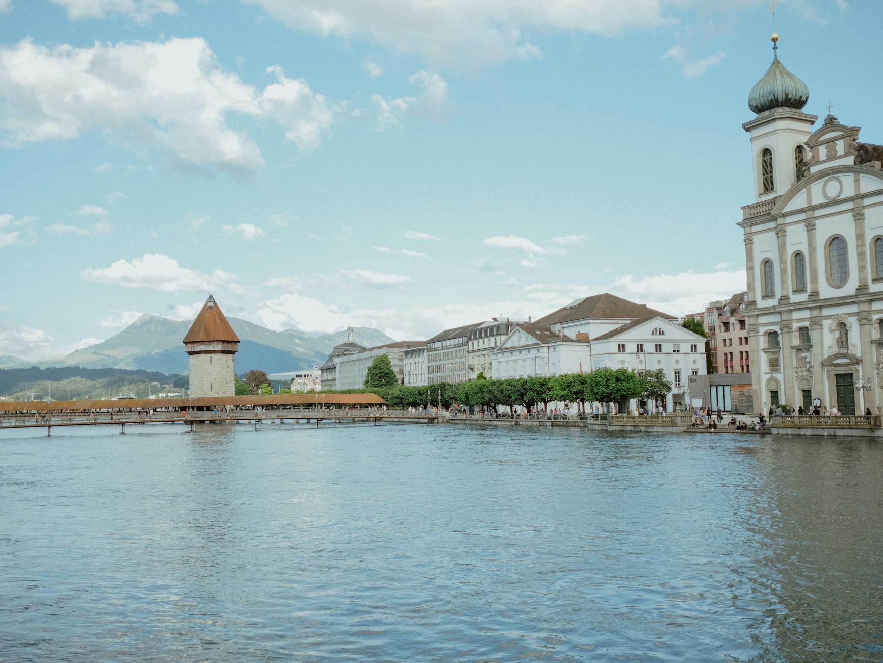 Chapel Bridge and Water Tower in Lucerne for pilgrimage mobility planning.