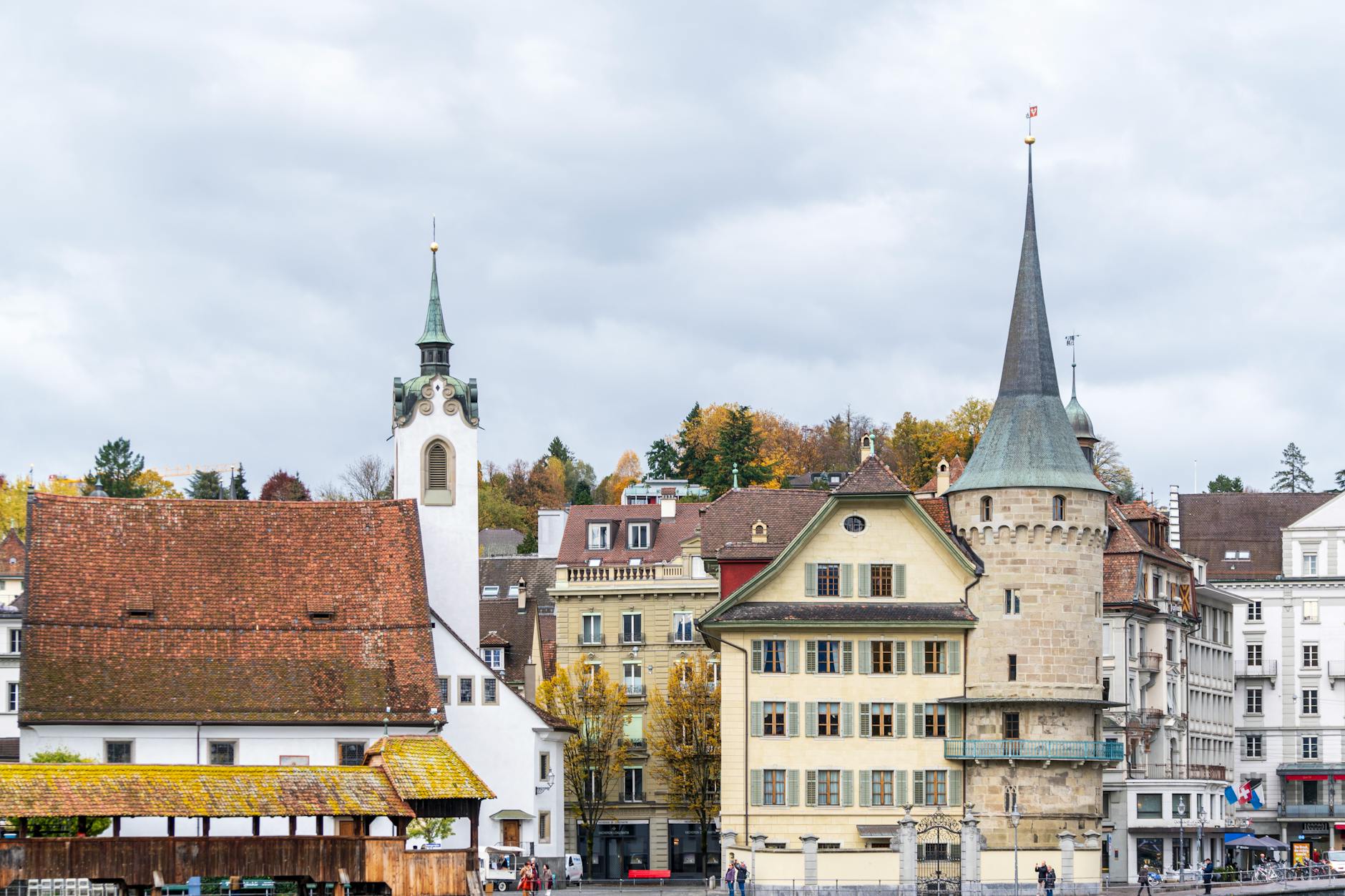 Autumn Chapel Bridge and Lucerne waterfront for pilgrimage travel report planning.