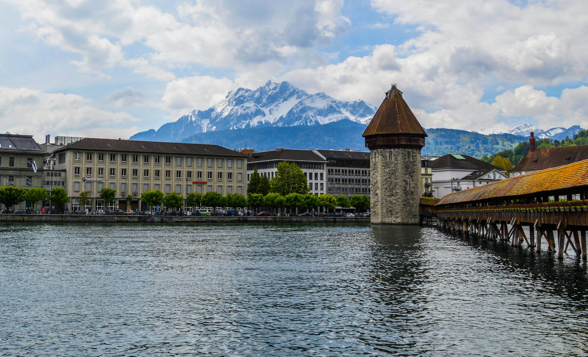 Lucerne bridge and mountain backdrop for sales arrival planning.