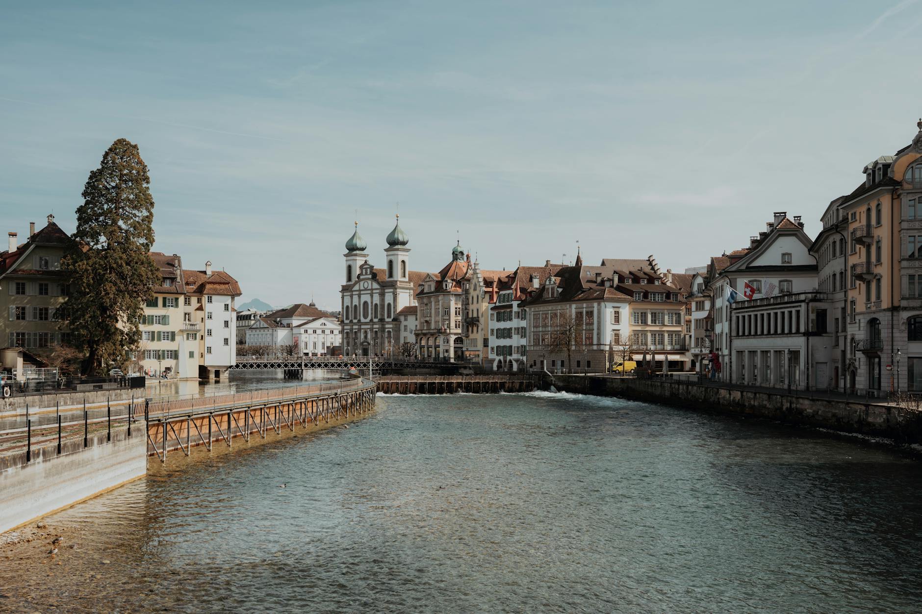 Lucerne buildings along the Reuss River for choosing between city and scenic plans.