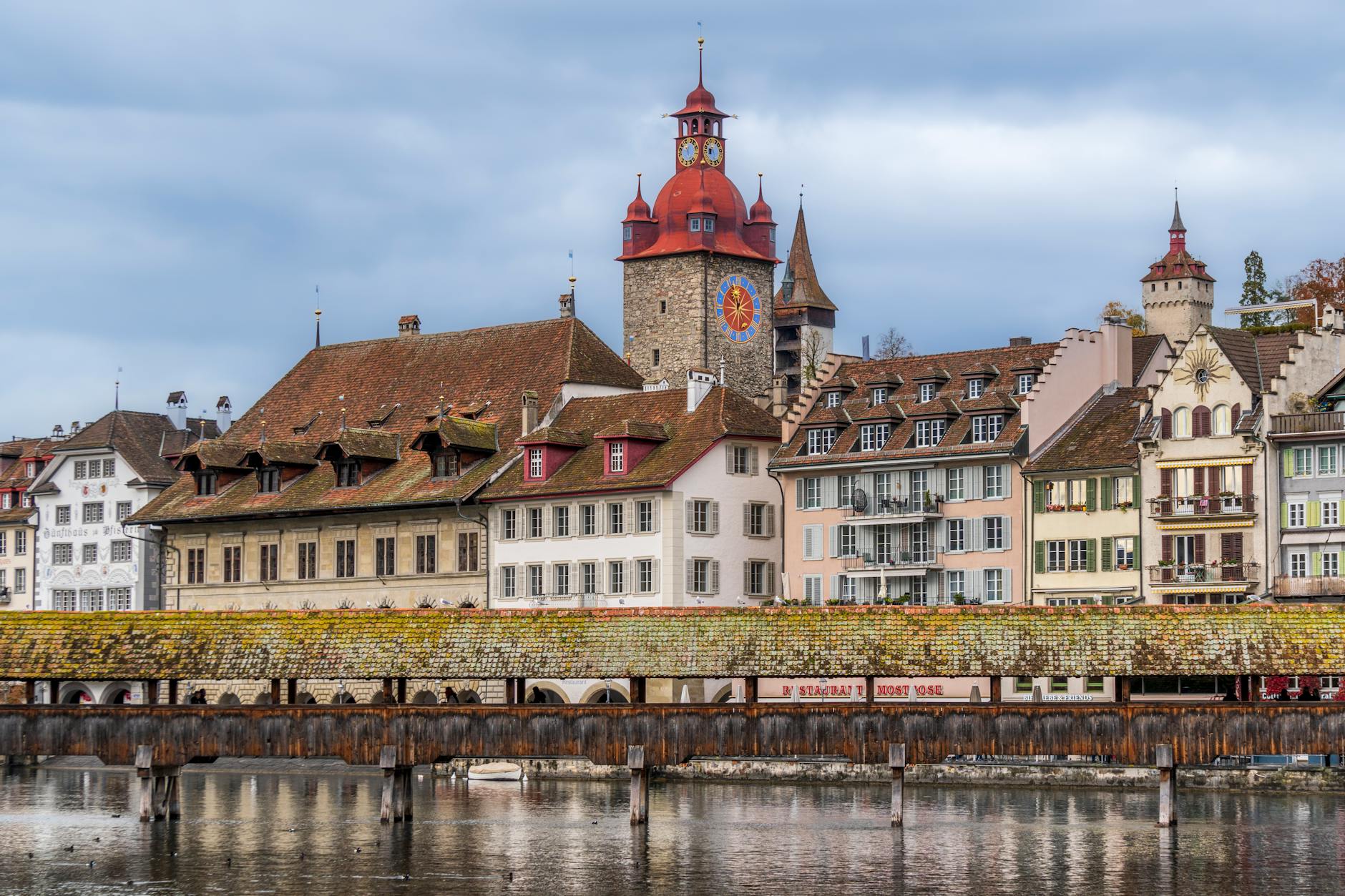 Lucerne waterfront and Chapel Bridge for stopover meal and route planning.