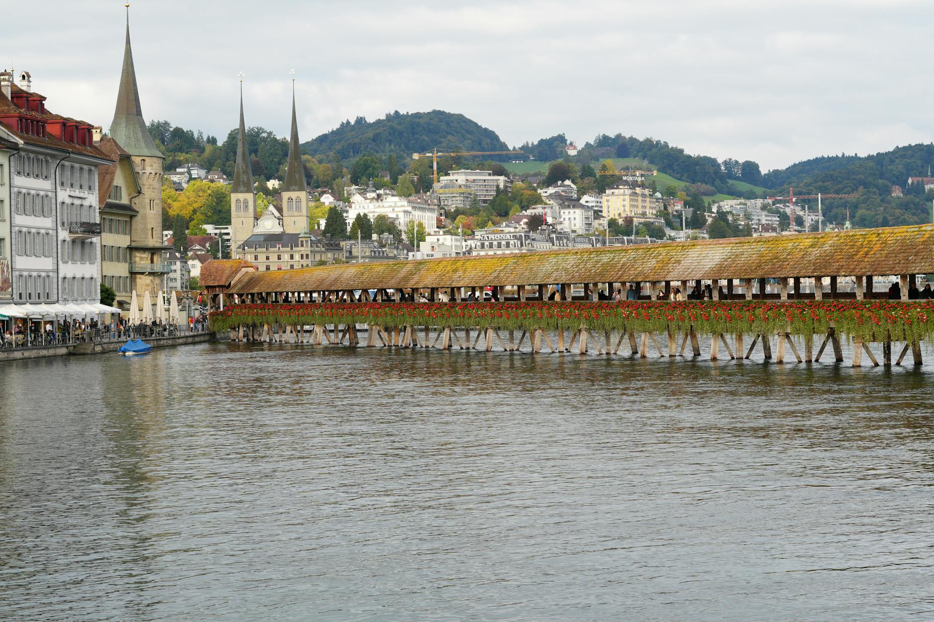 Chapel Bridge over the Reuss River for Lucerne transit route planning.