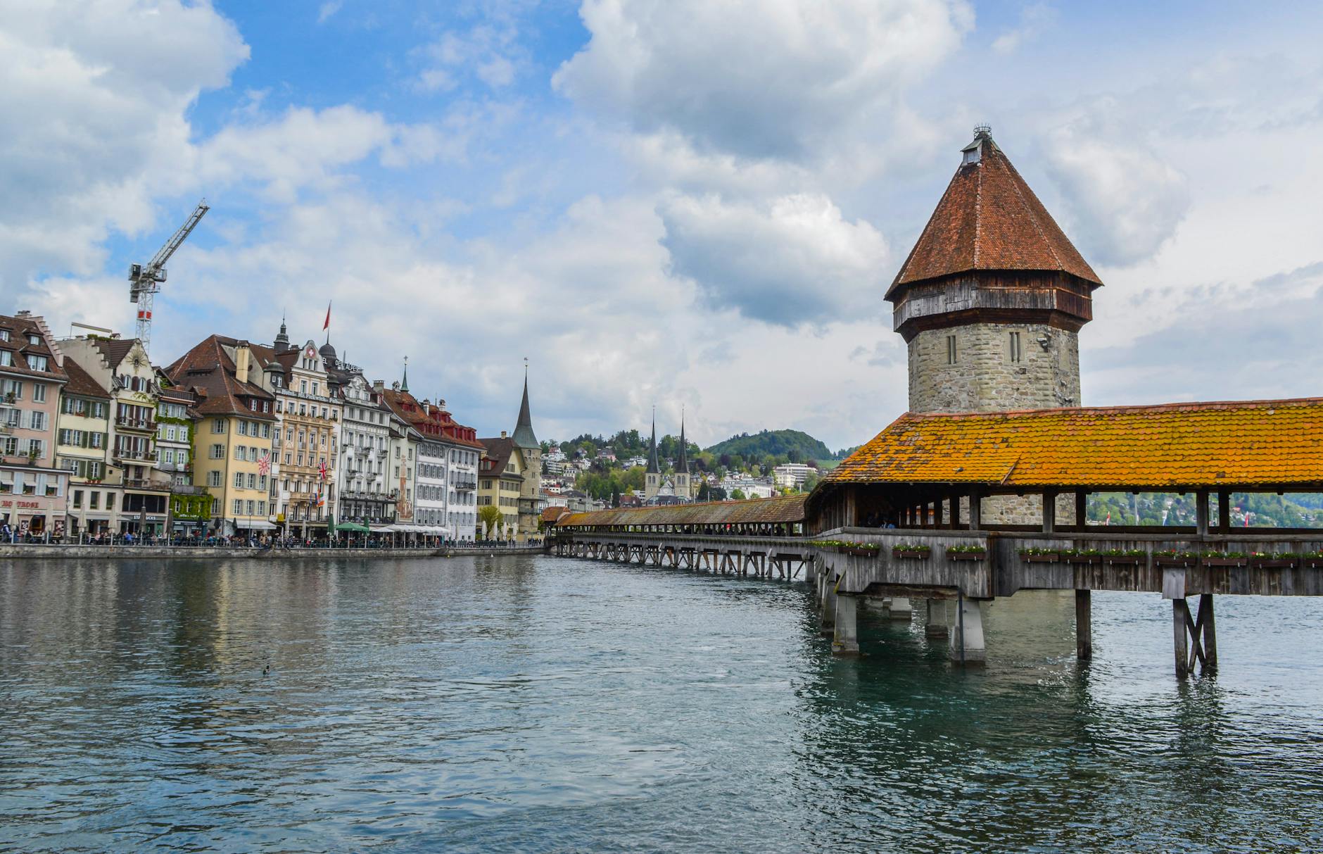 Covered bridge and river in Lucerne for stopover walking loop planning.