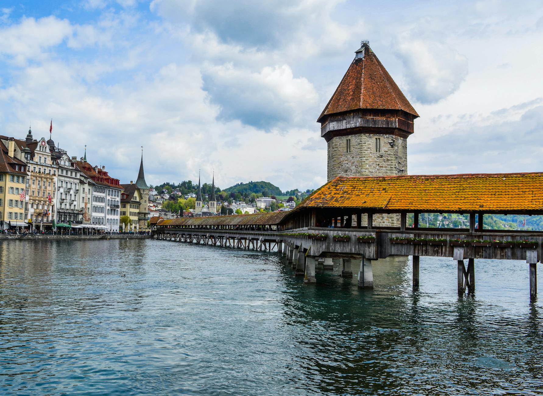 Chapel Bridge and Water Tower in Lucerne for mobility-aware hotel route planning.