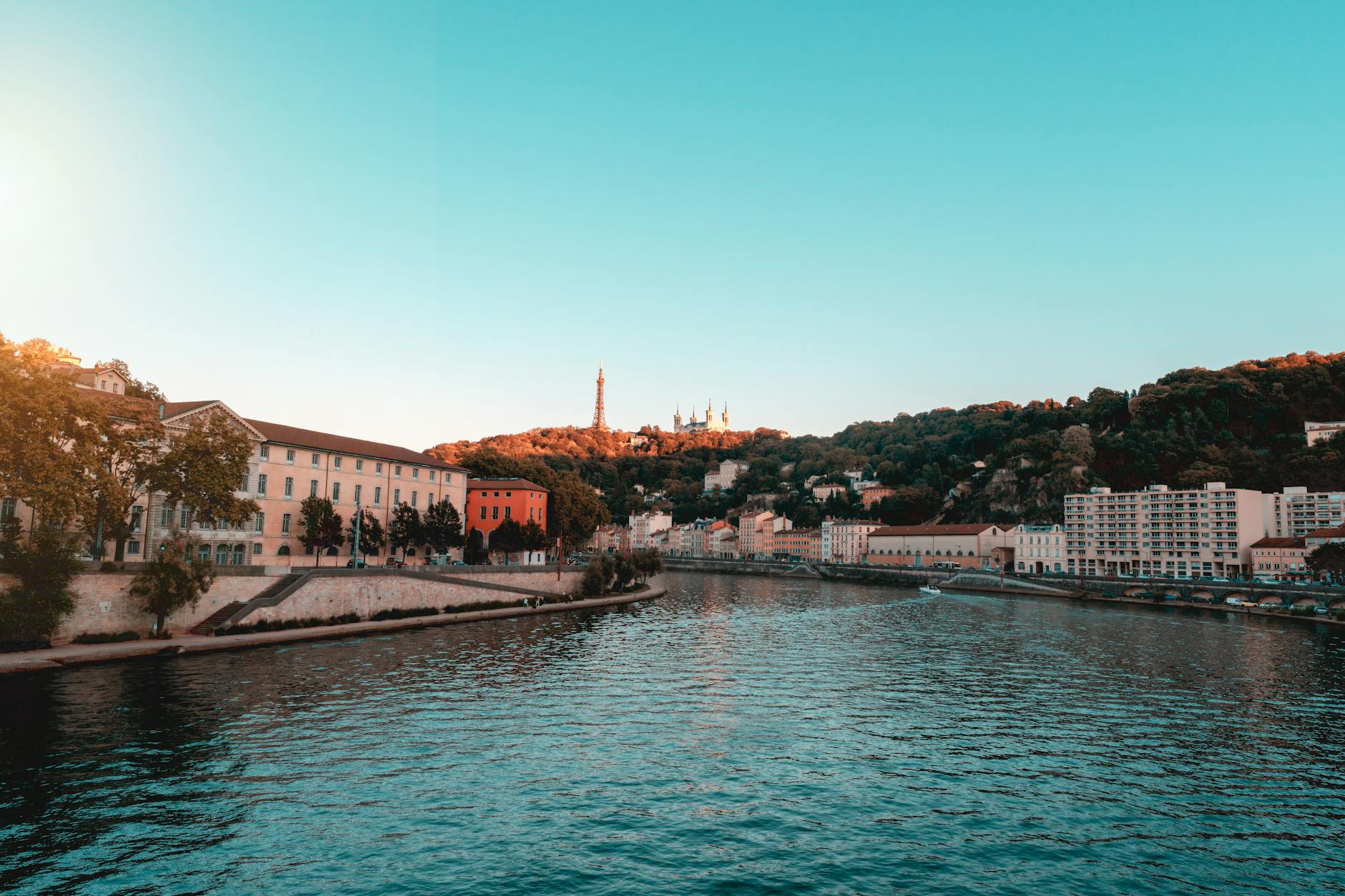 Lyon cityscape and river at sunset