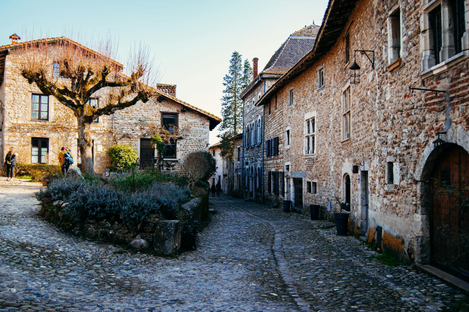 Cobblestone street and old stone buildings in Lyon