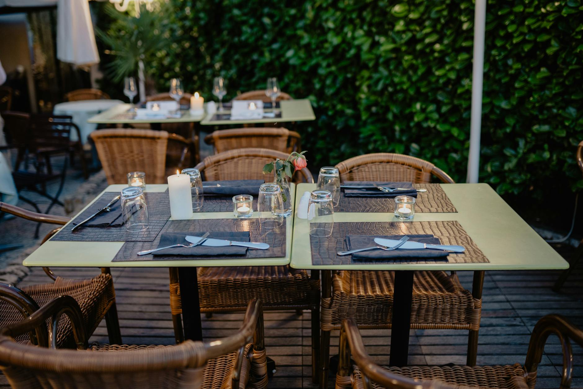 Quiet restaurant terrace arranged for evening dining