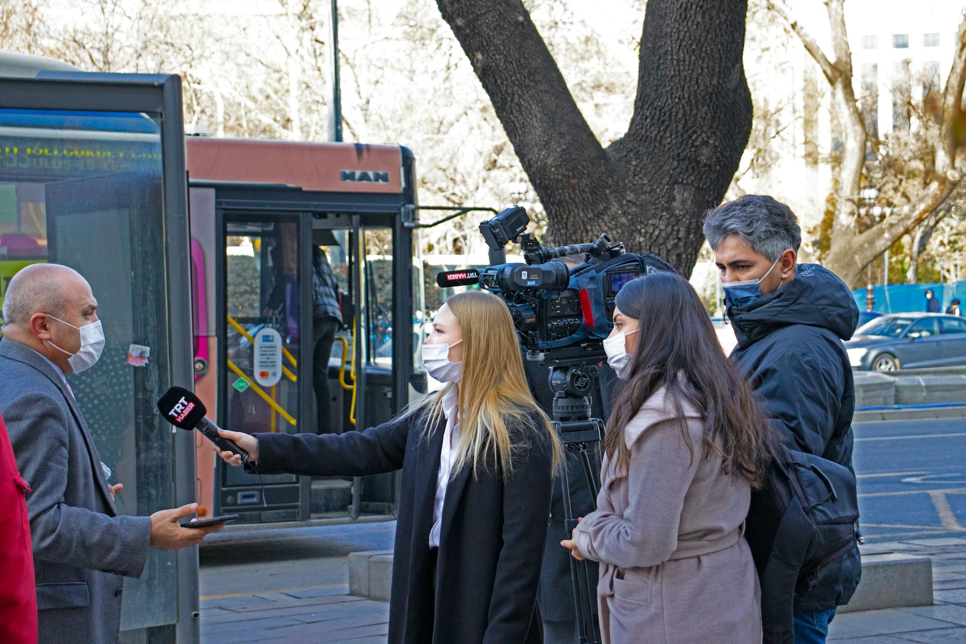 Journalists conducting a street interview