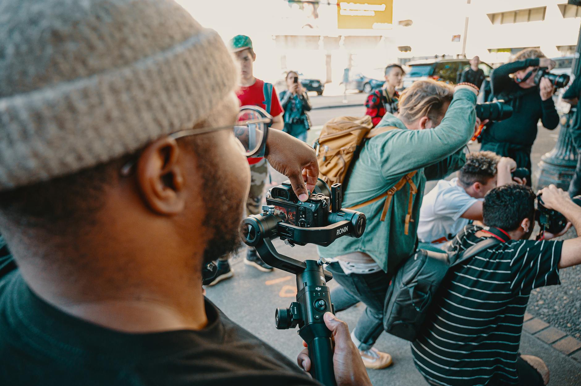 Photographers working together on a city street