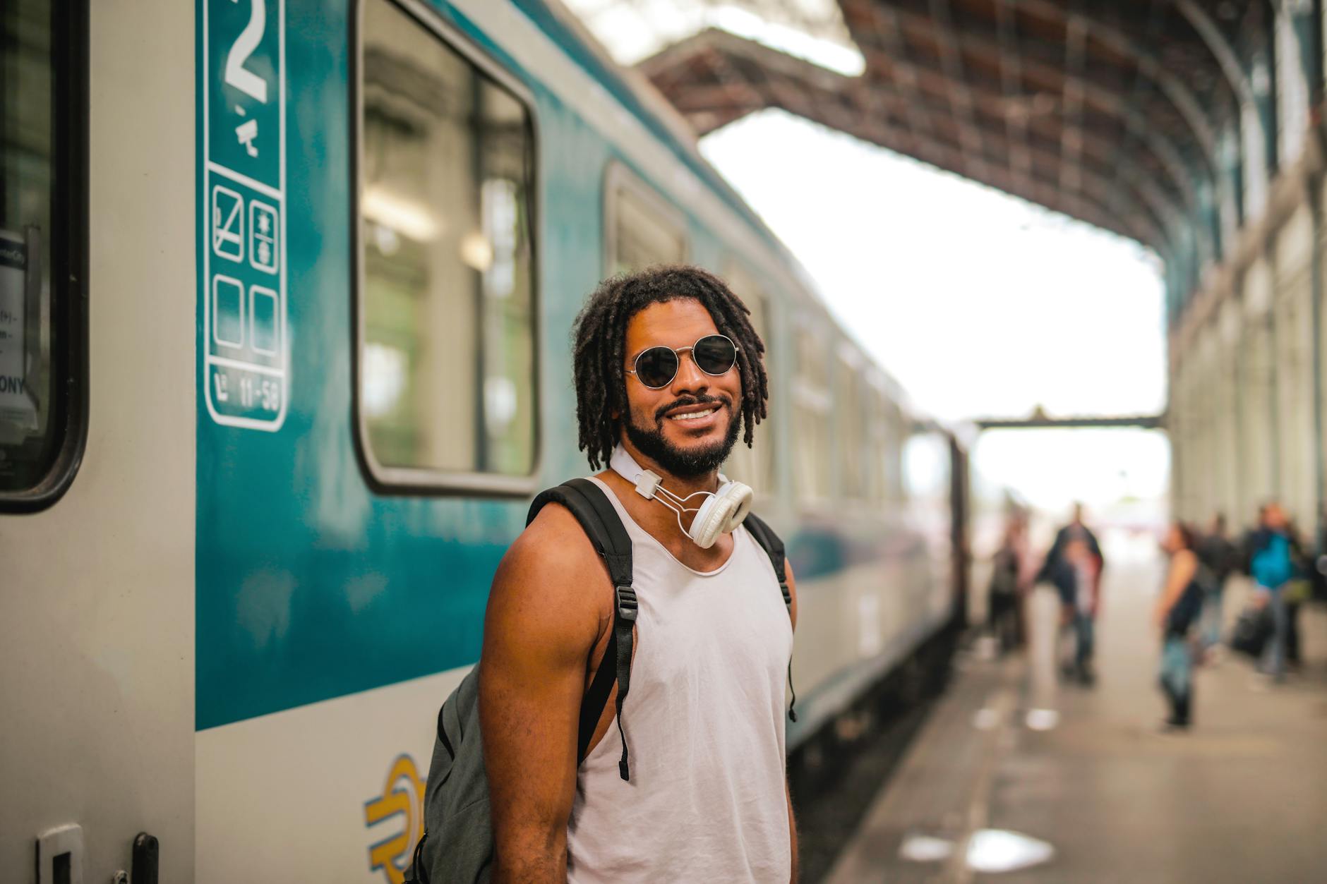 Young traveler waiting at a train station