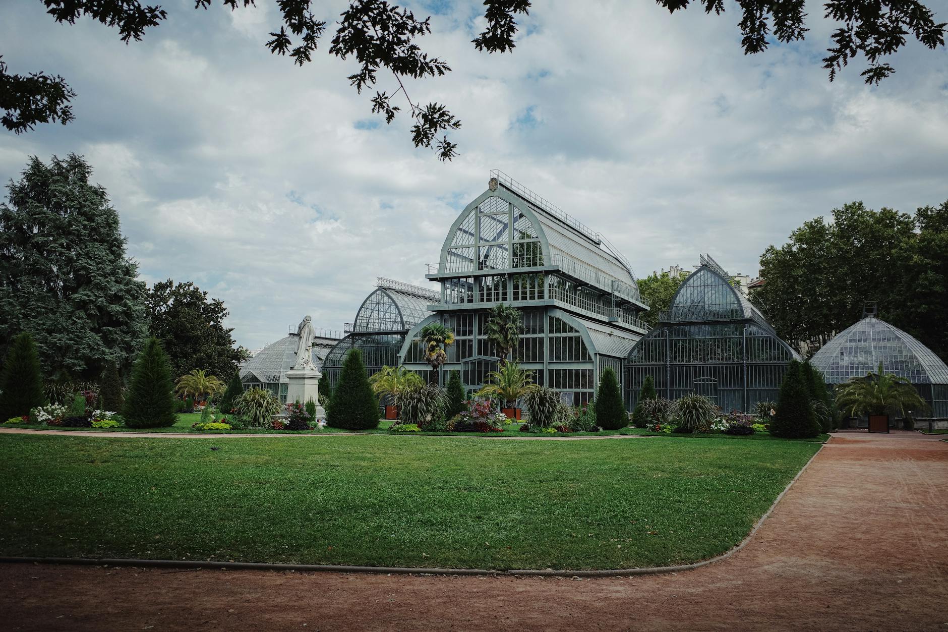Greenhouse architecture surrounded by botanical greenery