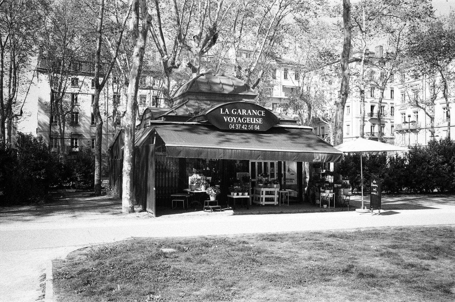 Urban kiosk and greenery in Lyon