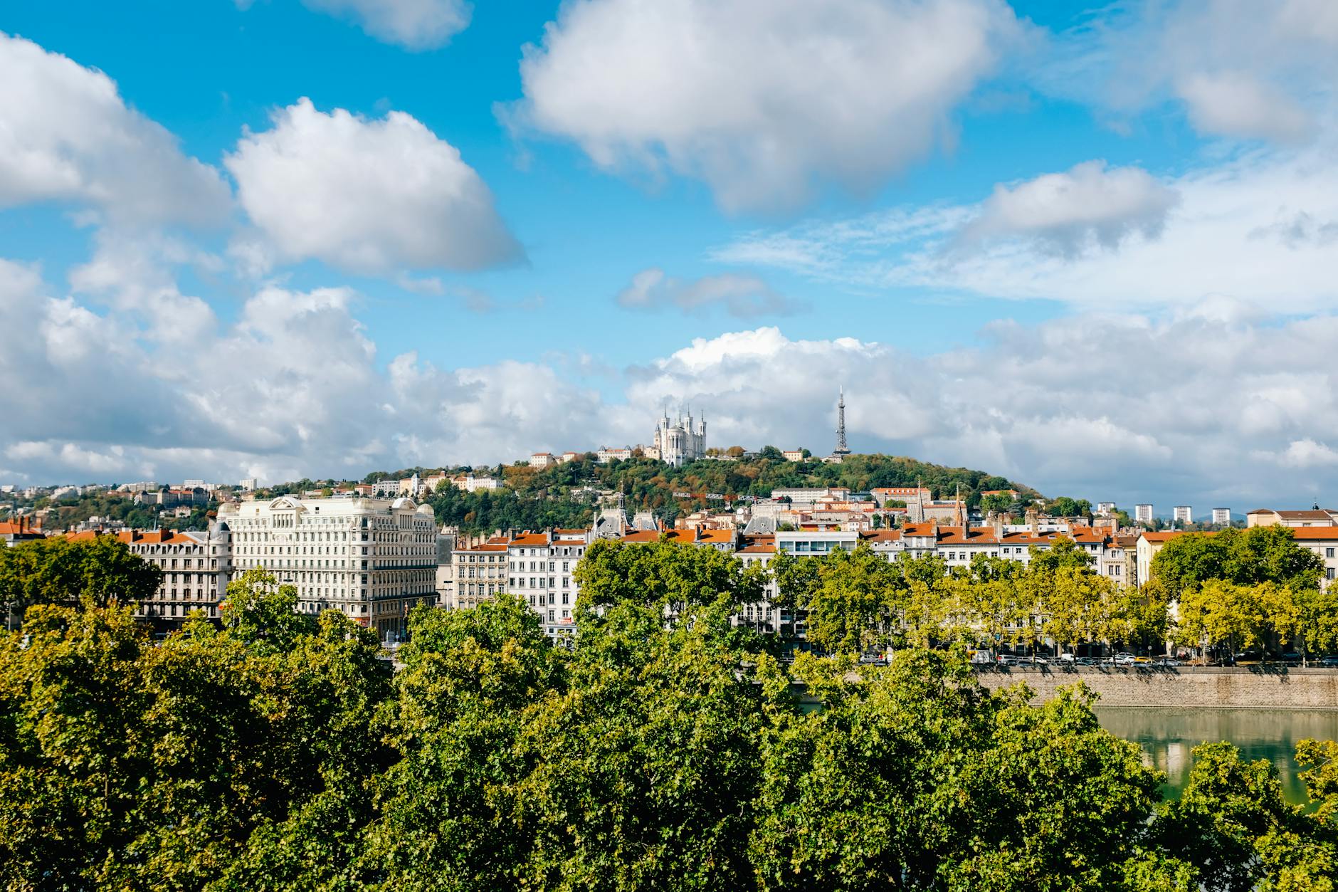 Lyon riverfront buildings and greenery