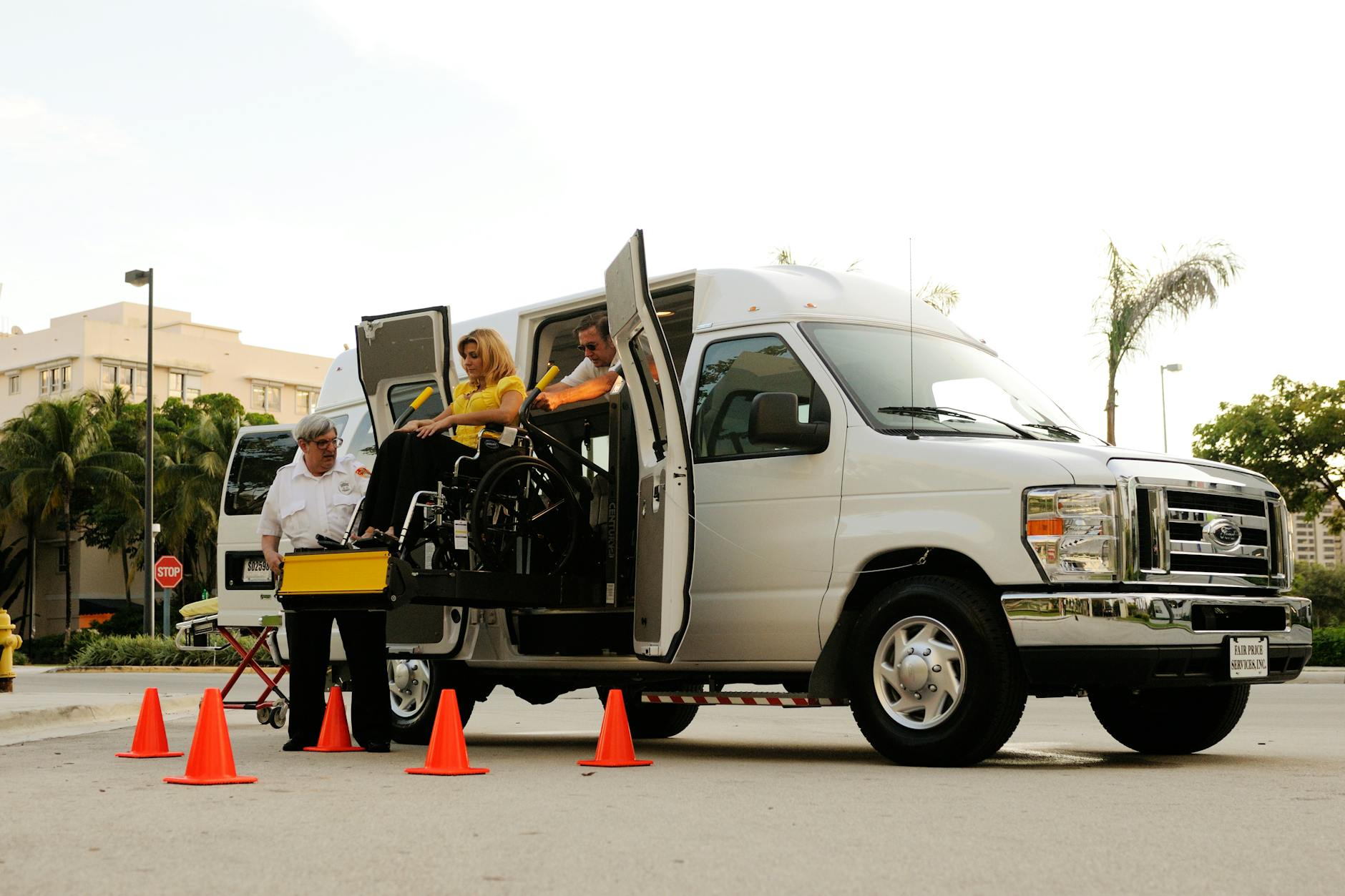 Wheelchair lift transferring a traveler into an accessible van