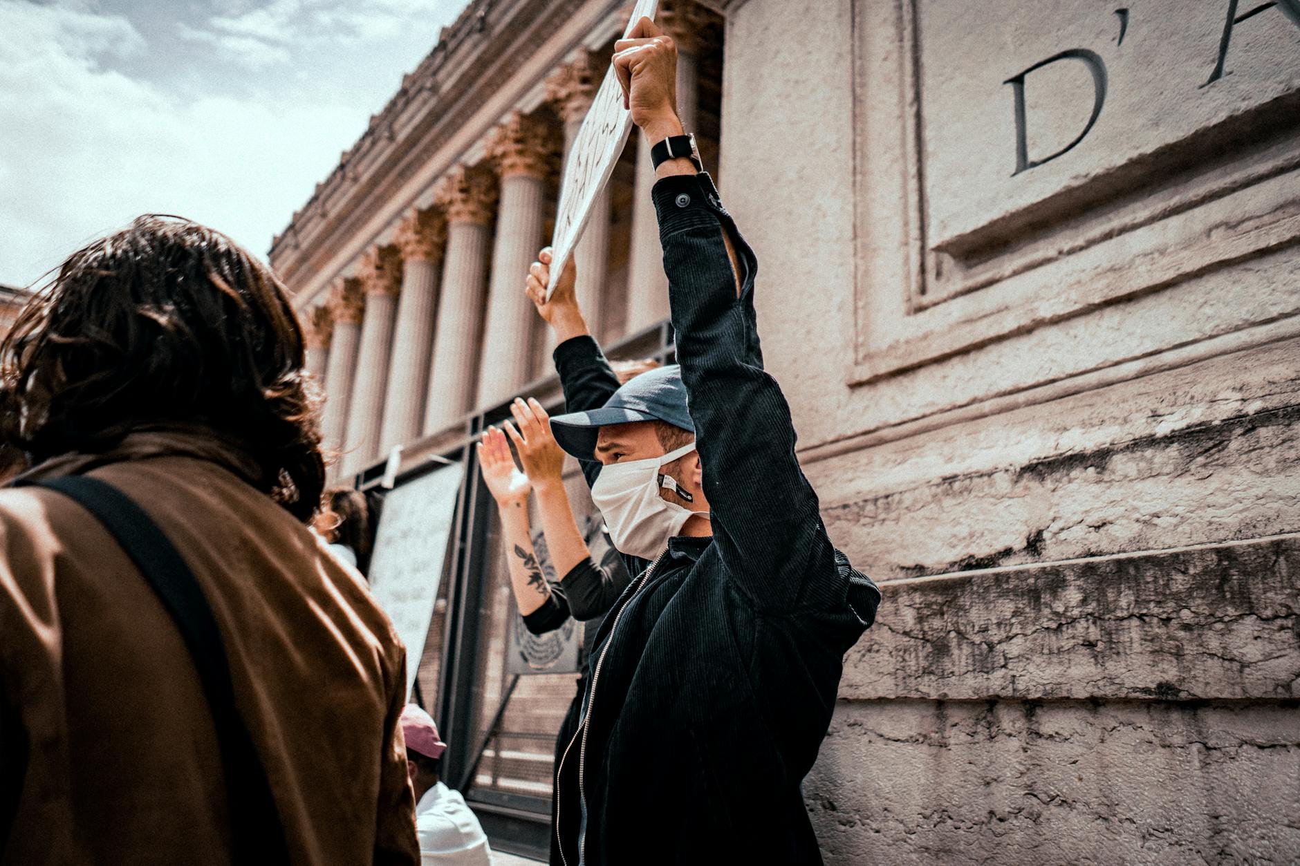 Masked protesters demonstrating in Lyon