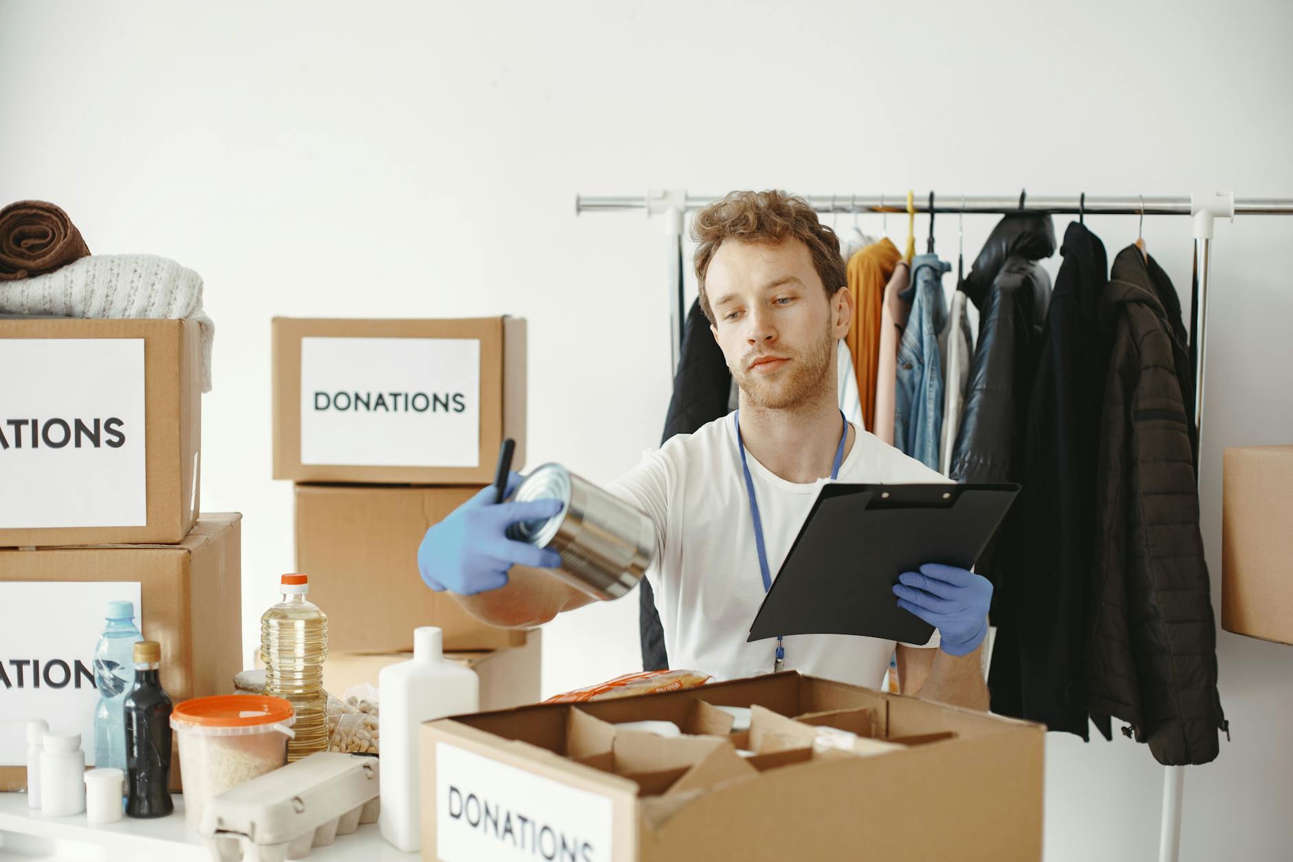 Volunteer organizing donations and maintaining records