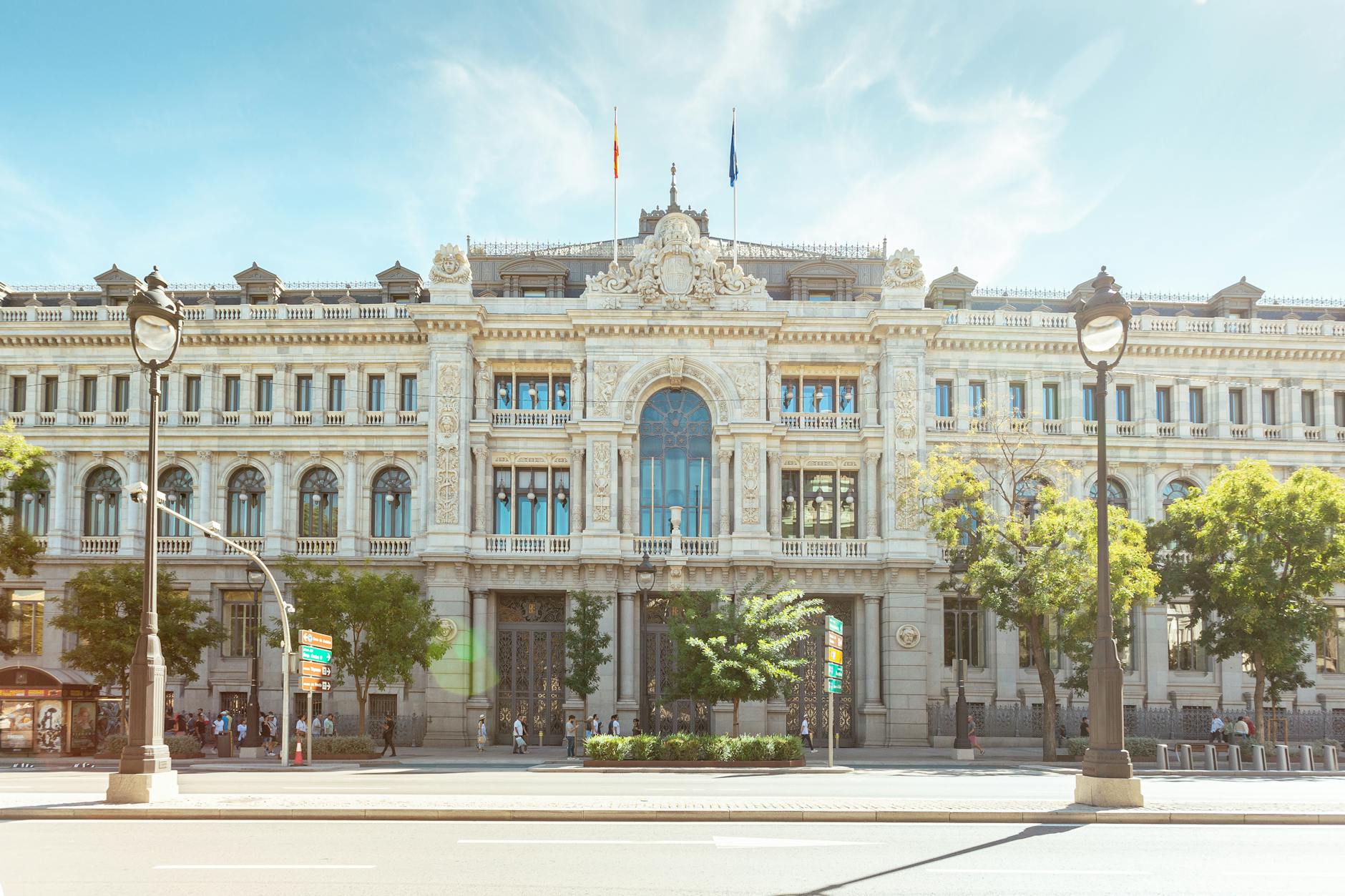 Bank of Spain building in Madrid with traffic and city activity