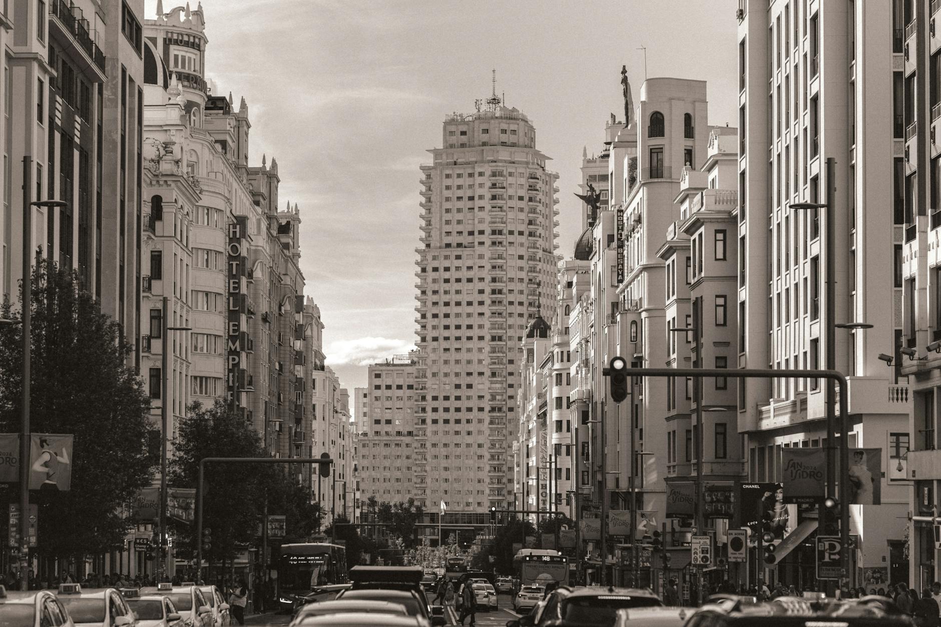 Gran Via in Madrid with traffic and classic architecture