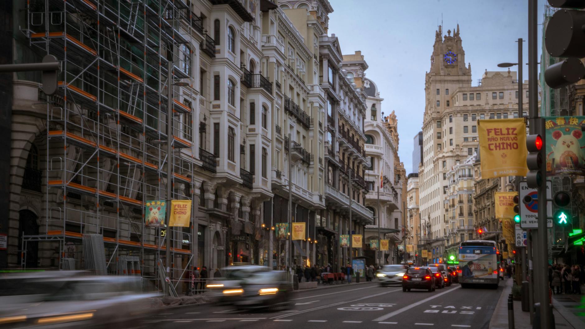 Gran Via traffic and the Telefonica Building in central Madrid